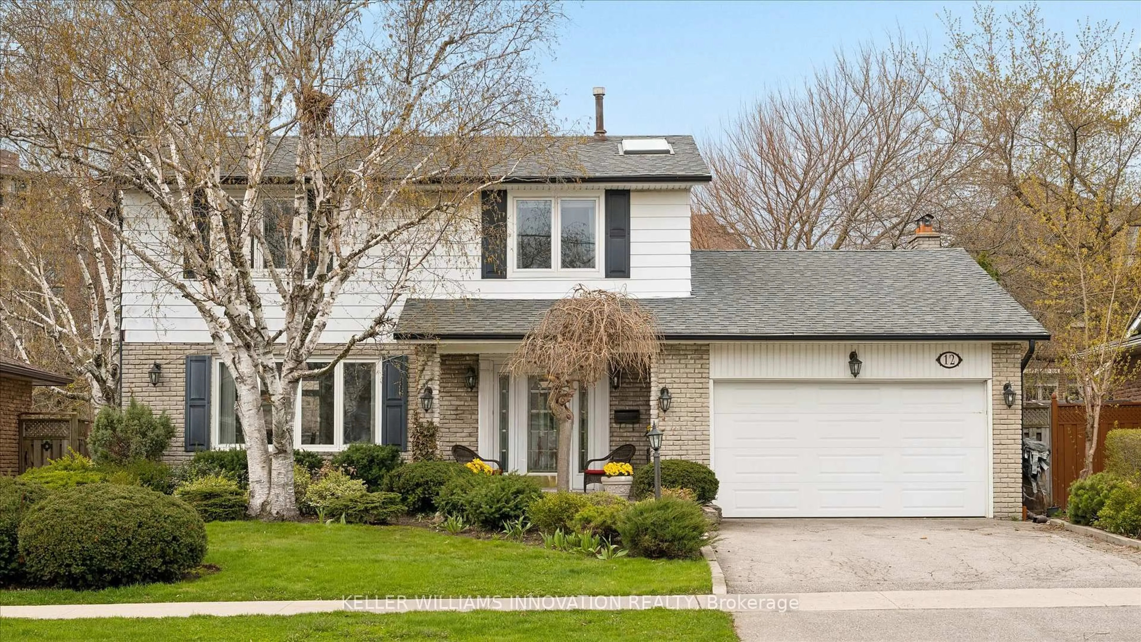 Home with vinyl exterior material, street for 12 Burnhamill Pl, Toronto Ontario M9C 3S4