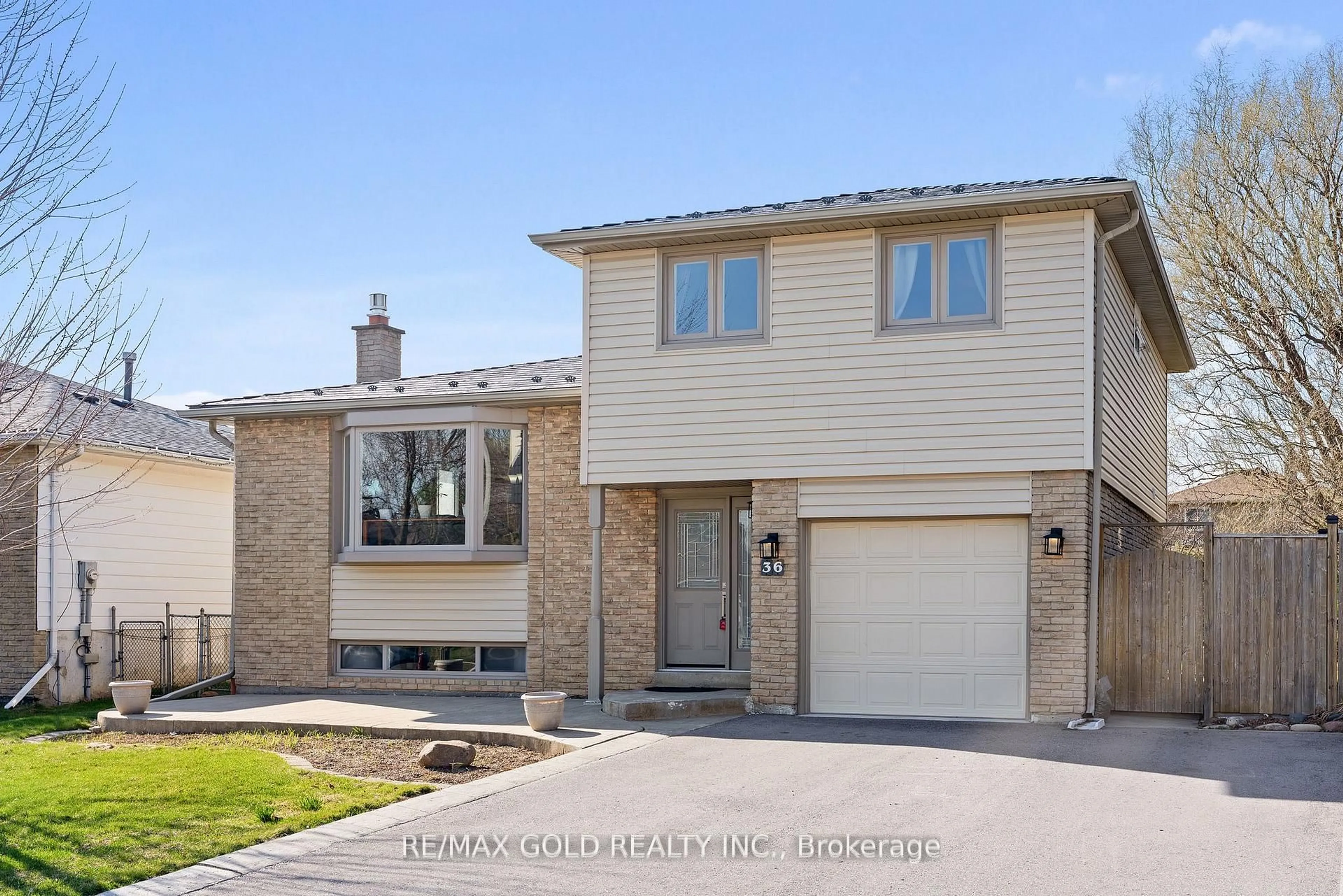 Home with brick exterior material, street for 36 Greenmount Rd, Brampton Ontario L6S 1L5