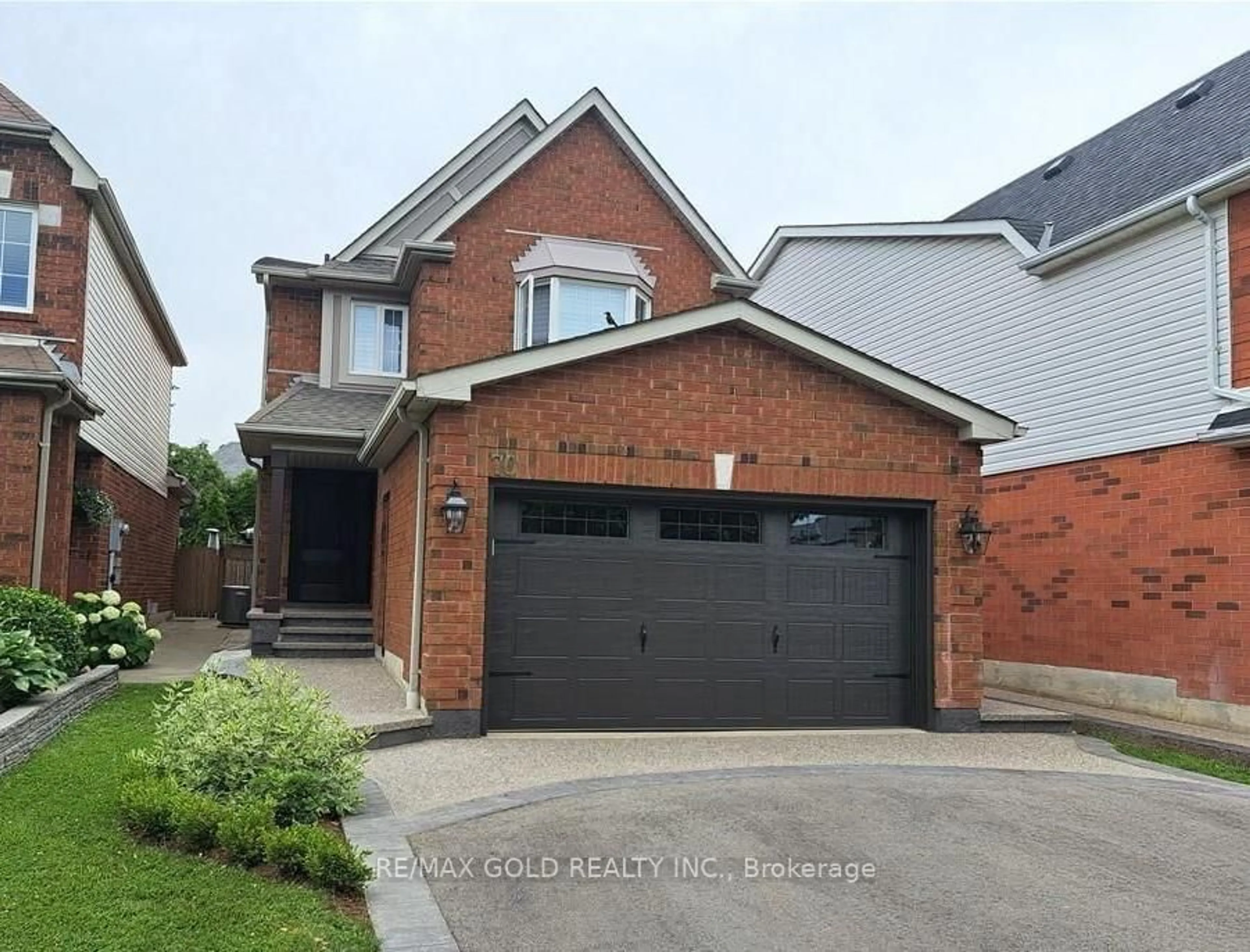 Home with brick exterior material, street for 70 Curry Cres, Halton Hills Ontario L7G 5T1
