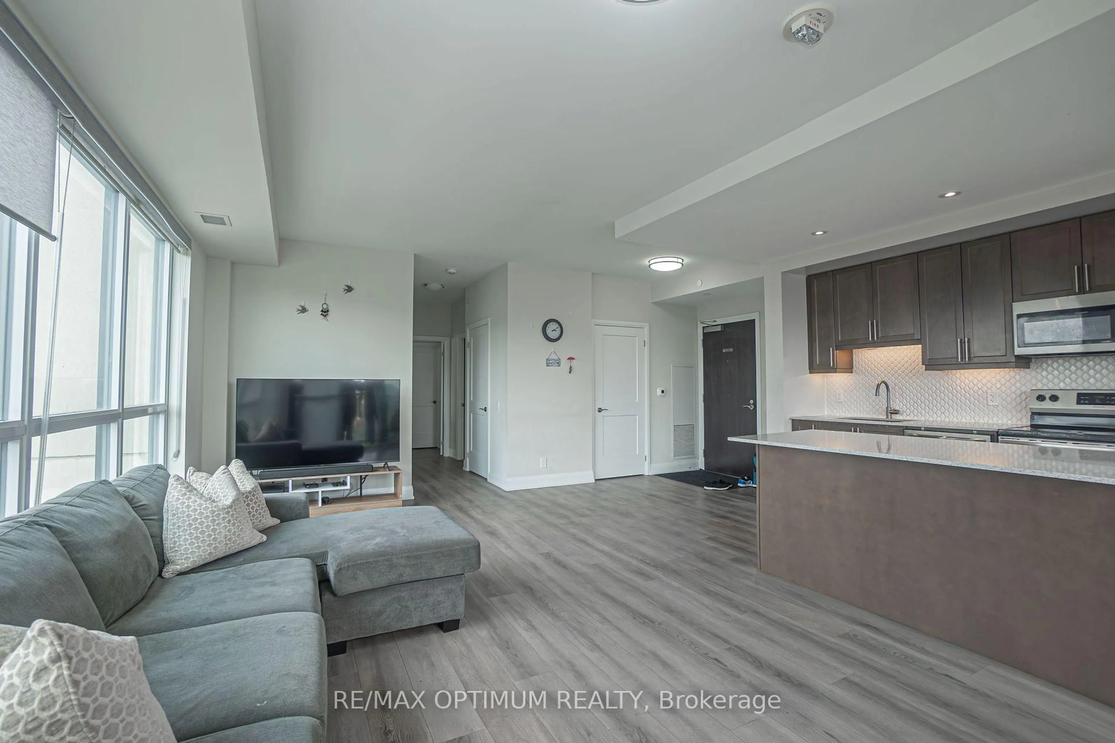Living room with furniture, unknown for 15 Lynch St #608, Brampton Ontario L6W 0C7