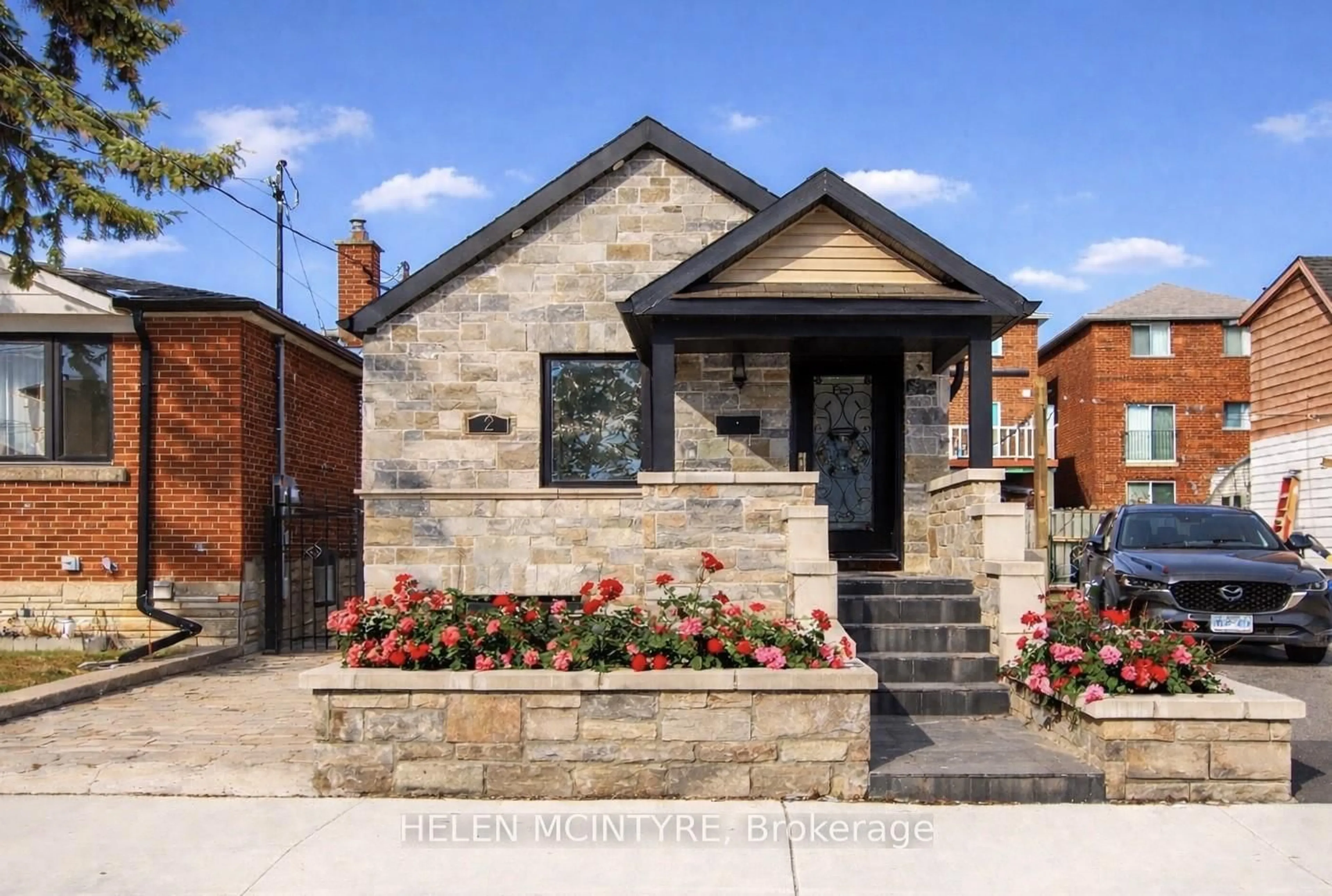 Home with brick exterior material, street for 2 Birch Tree Cres, Toronto Ontario M6M 2K8