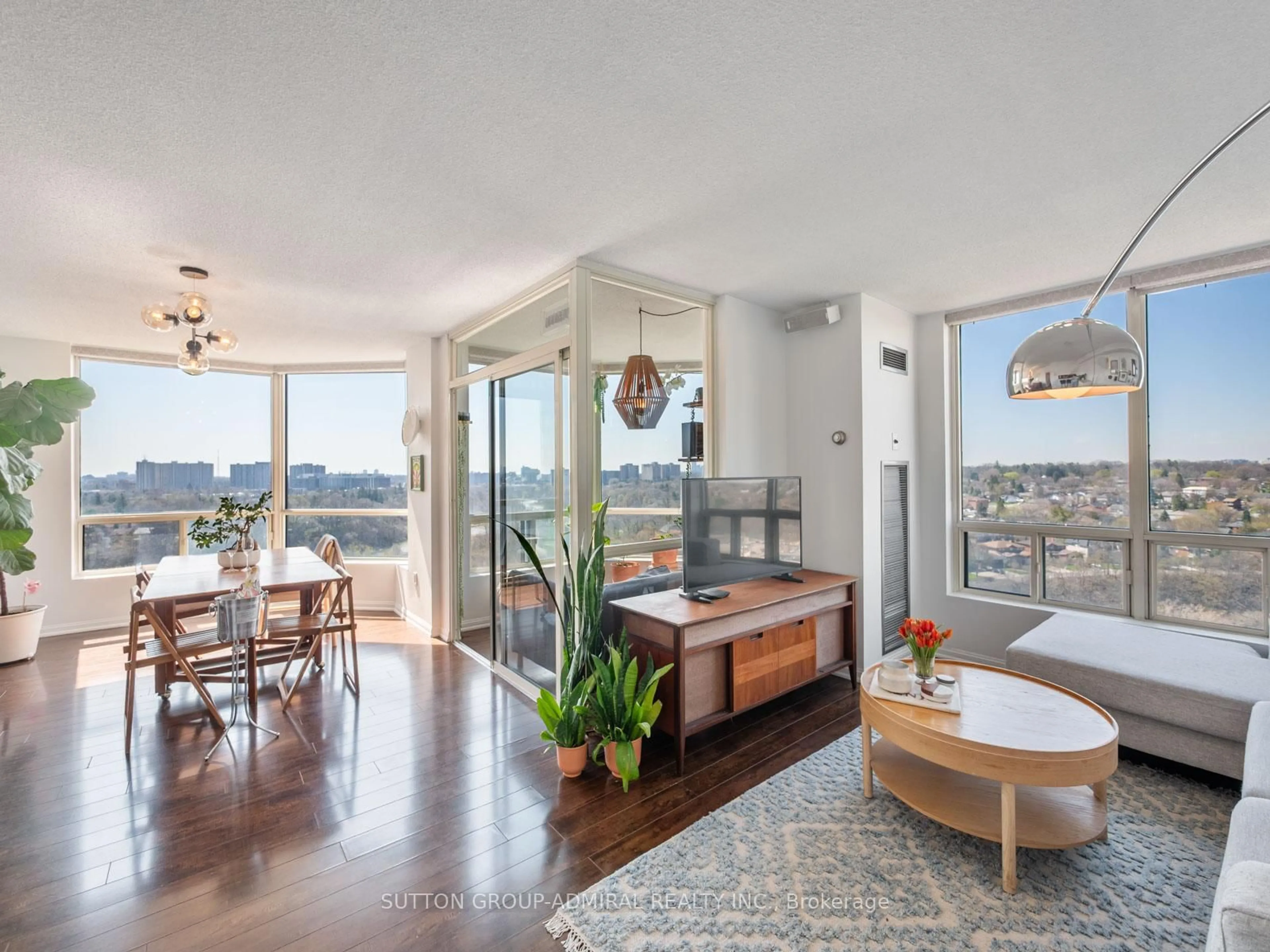 Living room with furniture, wood/laminate floor for 3 Hickory Tree Rd #1603, Toronto Ontario M9N 3W5