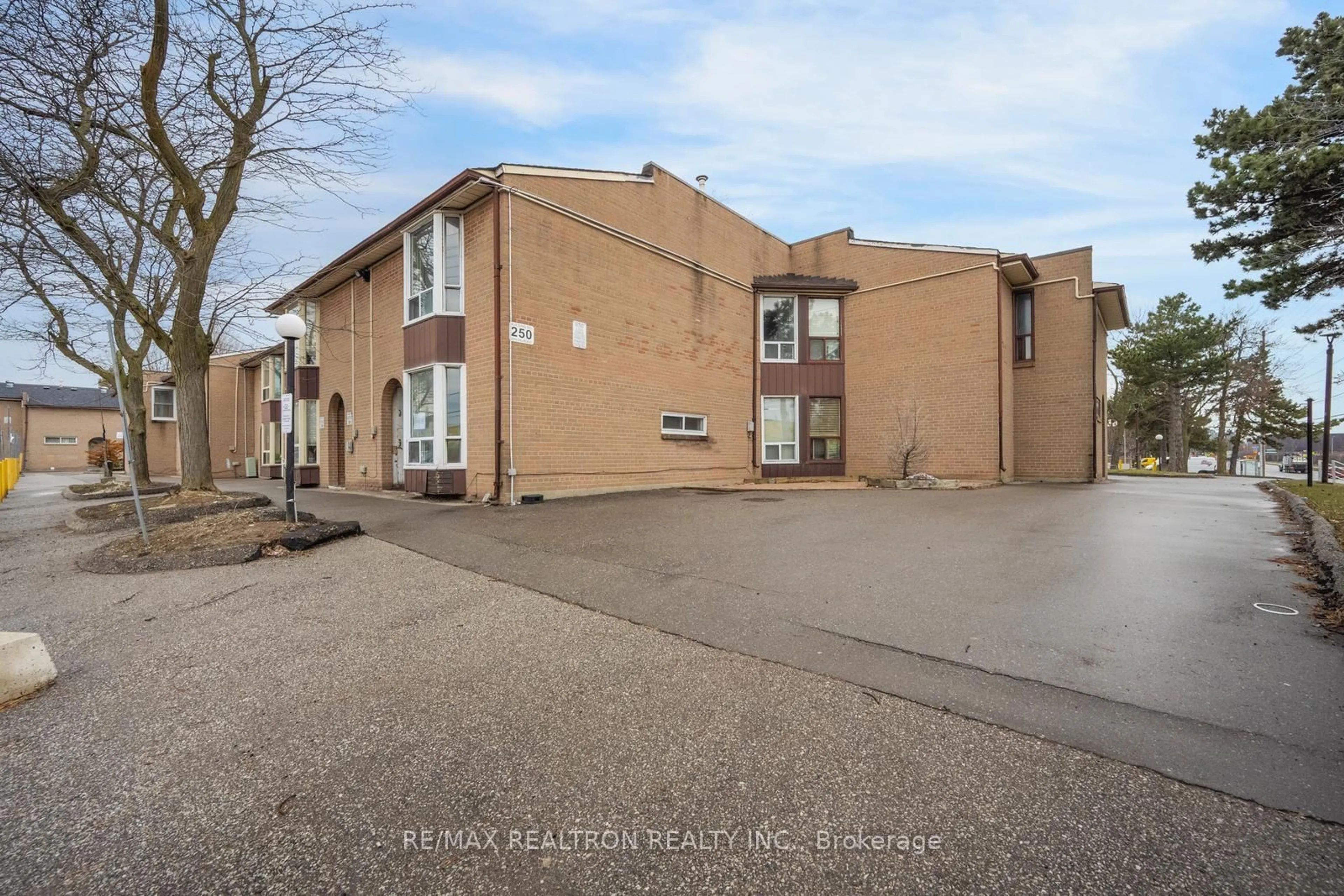 A pic from outside/outdoor area/front of a property/back of a property/a pic from drone, building for 250 John Garland Blvd #106, Toronto Ontario M9V 1N8