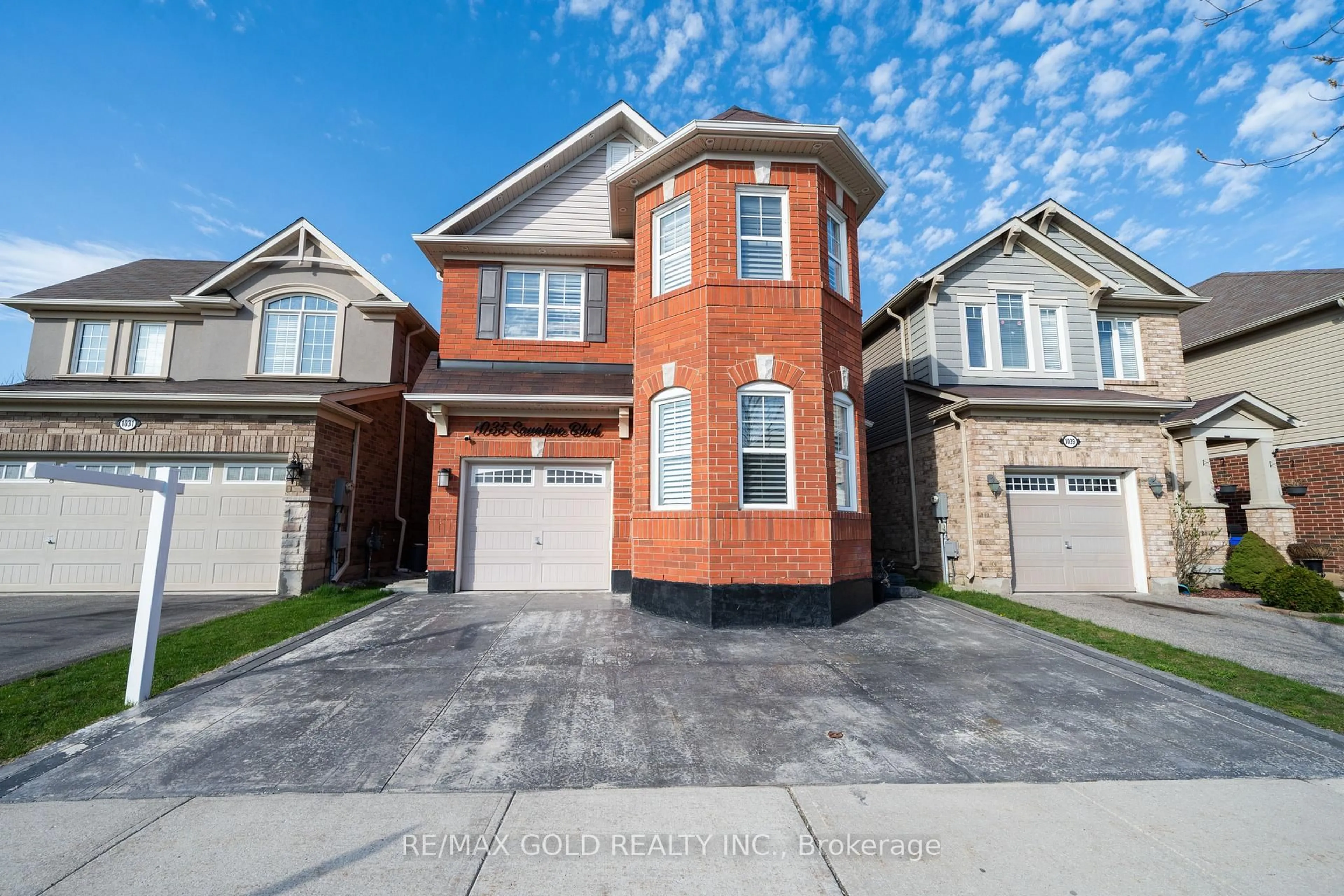 Home with brick exterior material, street for 1035 SAVOLINE Blvd, Milton Ontario L9T 8P2