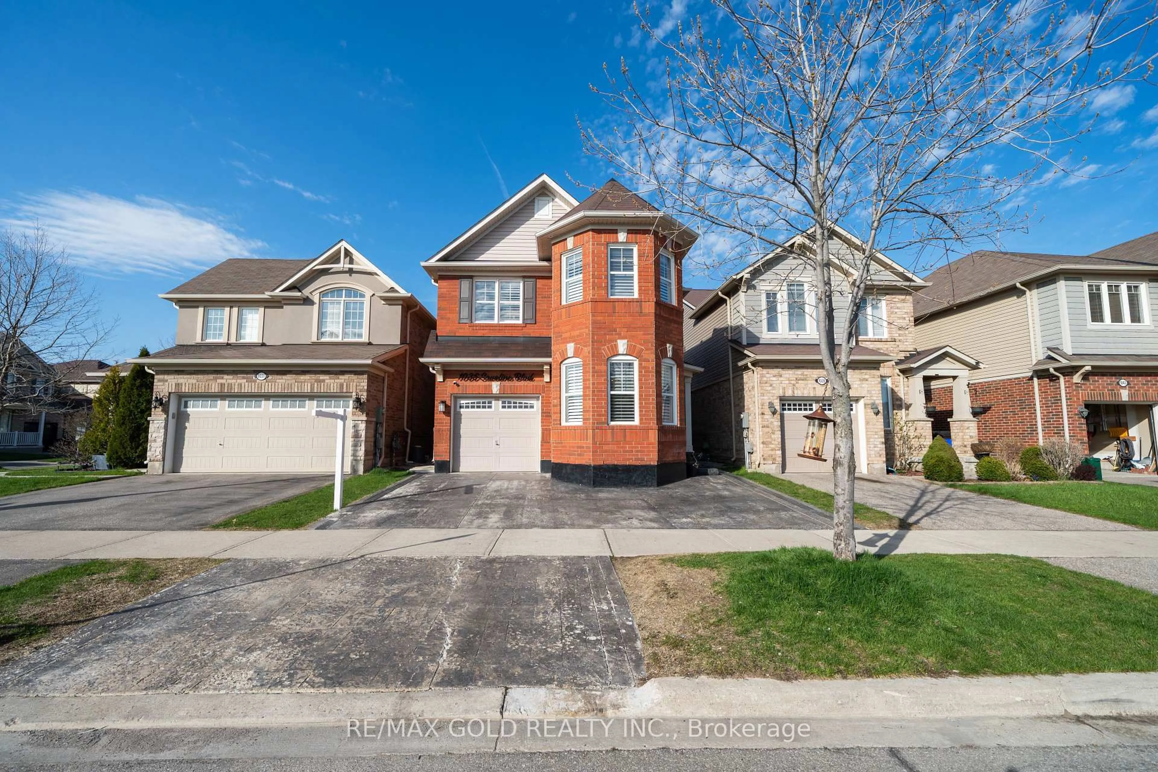 Home with brick exterior material, street for 1035 SAVOLINE Blvd, Milton Ontario L9T 8P2