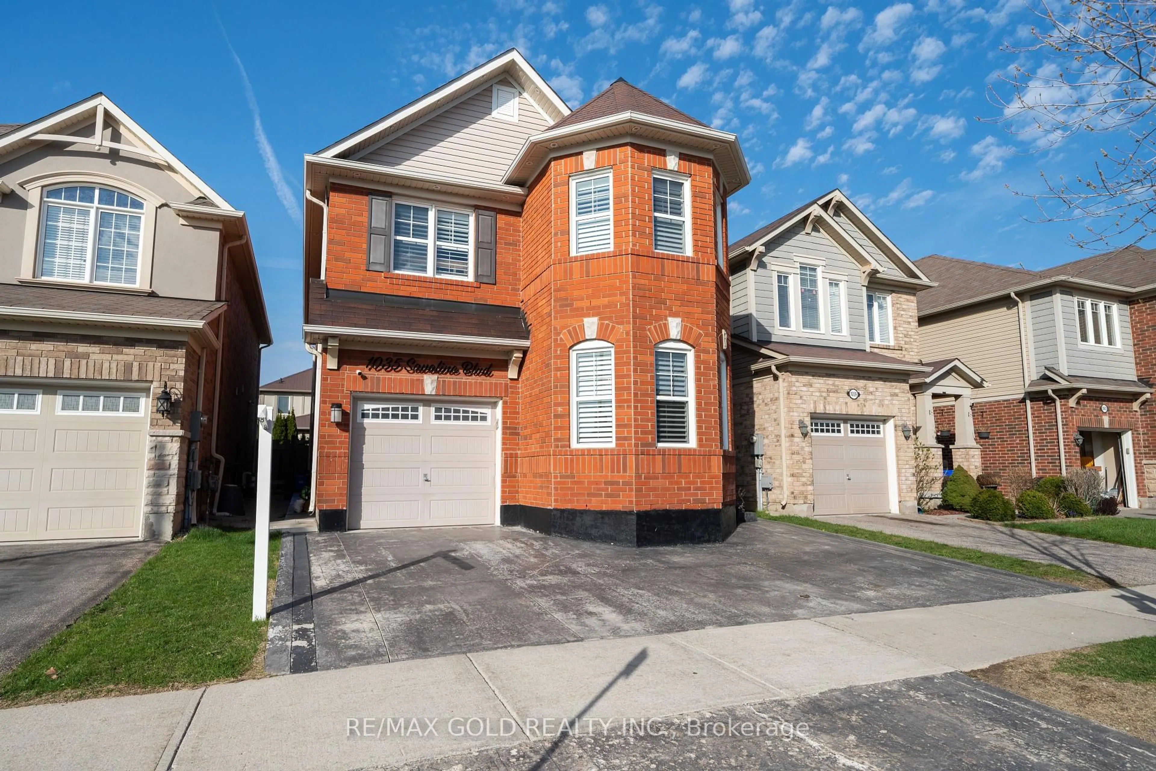 Home with brick exterior material, street for 1035 SAVOLINE Blvd, Milton Ontario L9T 8P2