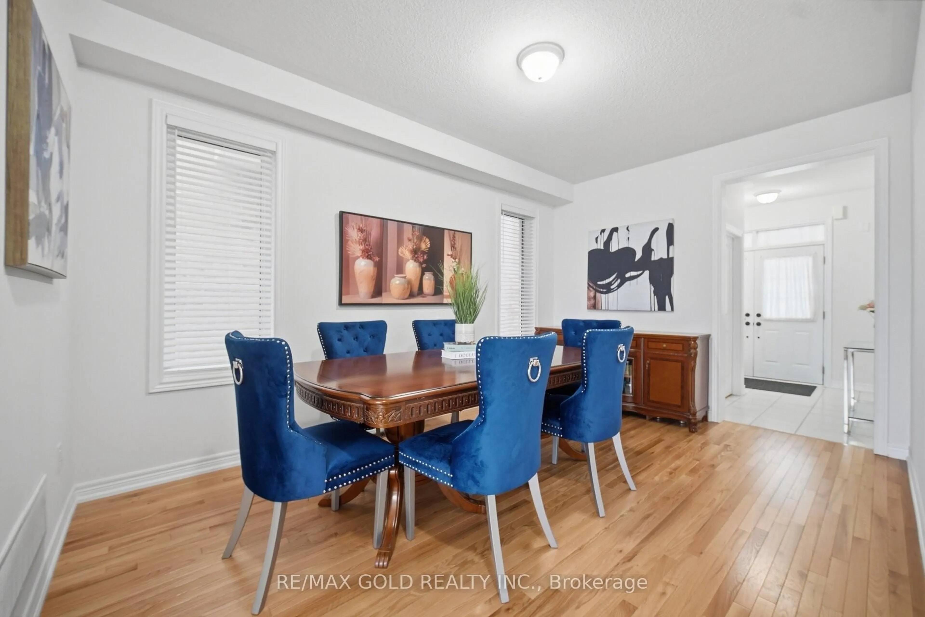 Dining room, wood/laminate floor for 26 Geranium Cres, Brampton Ontario L6Y 1N8