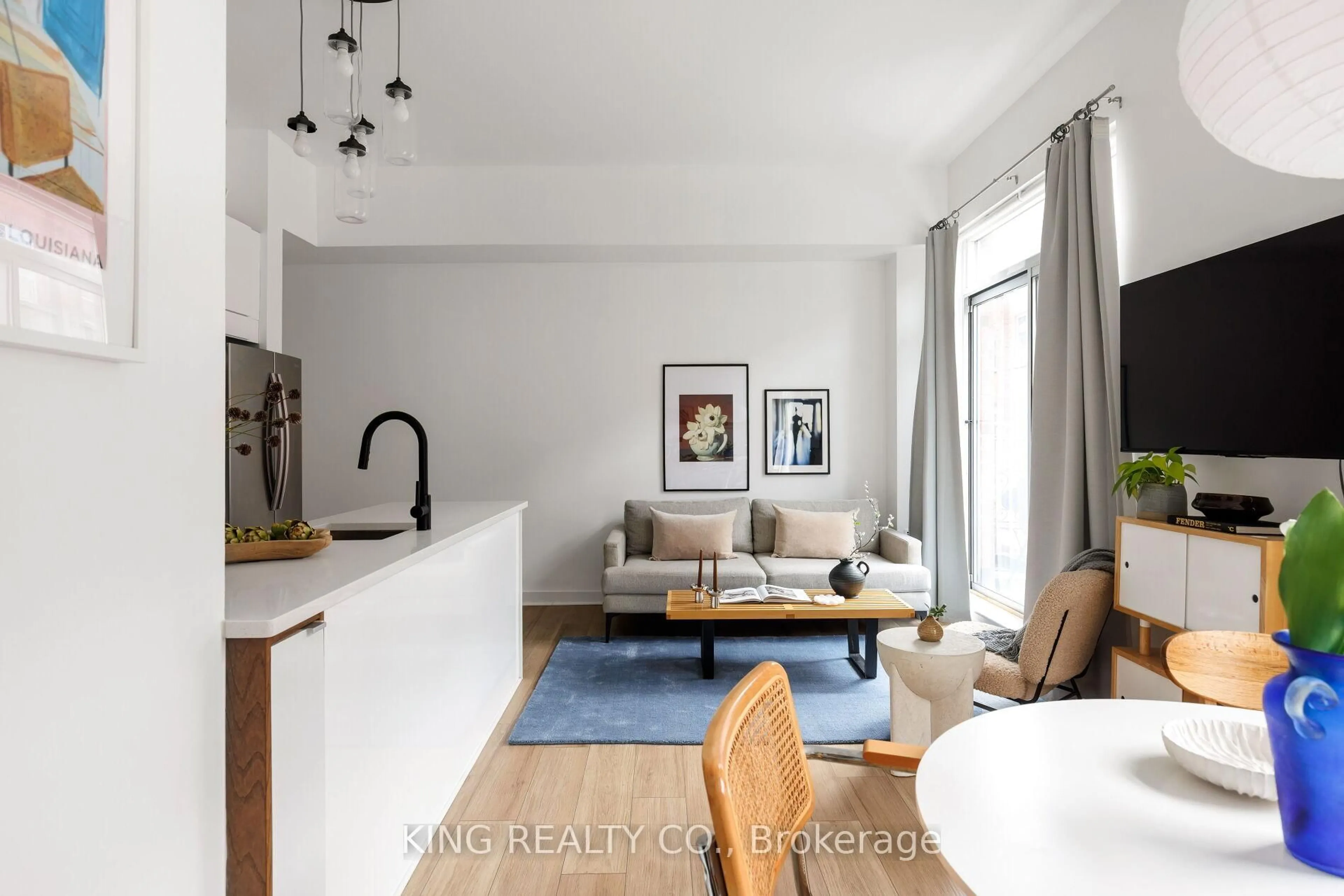 Living room with furniture, unknown for 27 Dekoven Mews #2, Toronto Ontario M6P 4H5