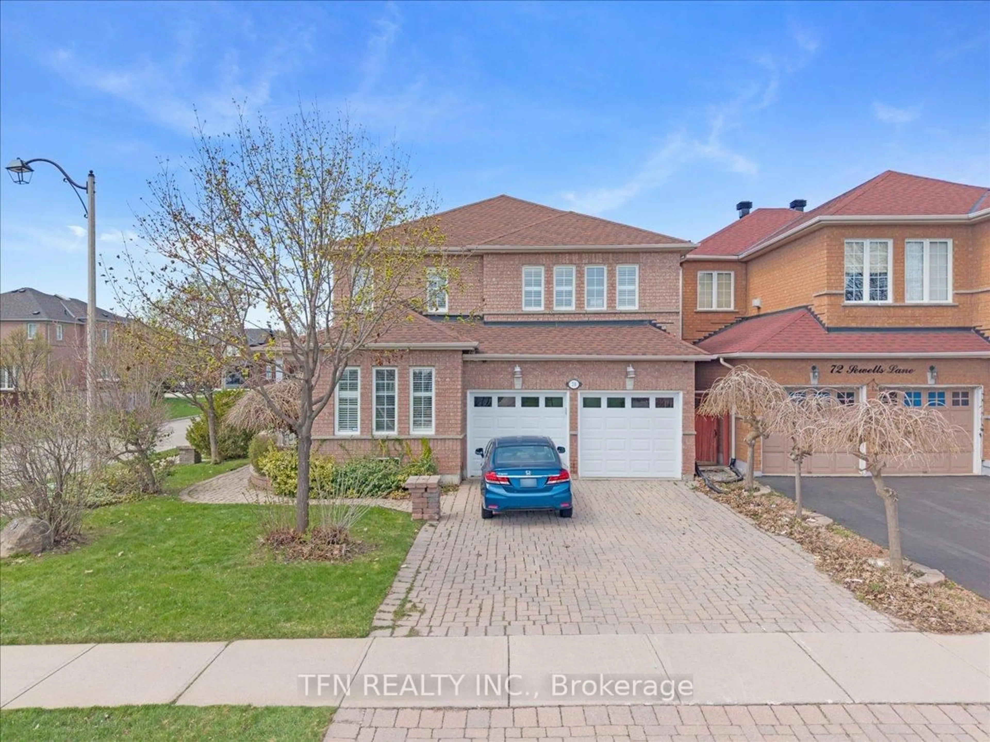 Home with brick exterior material, street for 70 Sewells Lane, Brampton Ontario L7A 2Z8