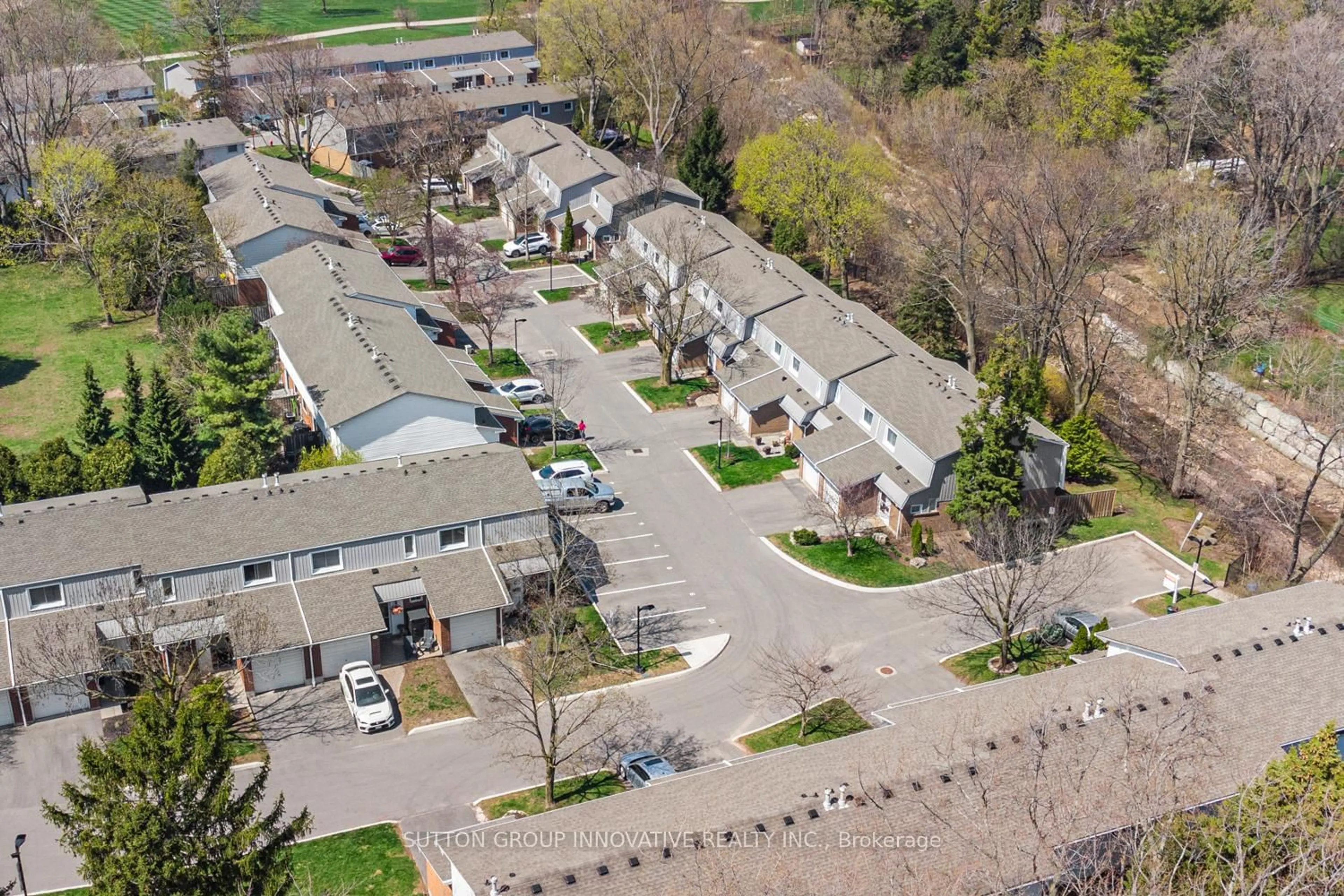 A pic from outside/outdoor area/front of a property/back of a property/a pic from drone, street for 457 Woodview Rd #4, Burlington Ontario L7N 2Z9