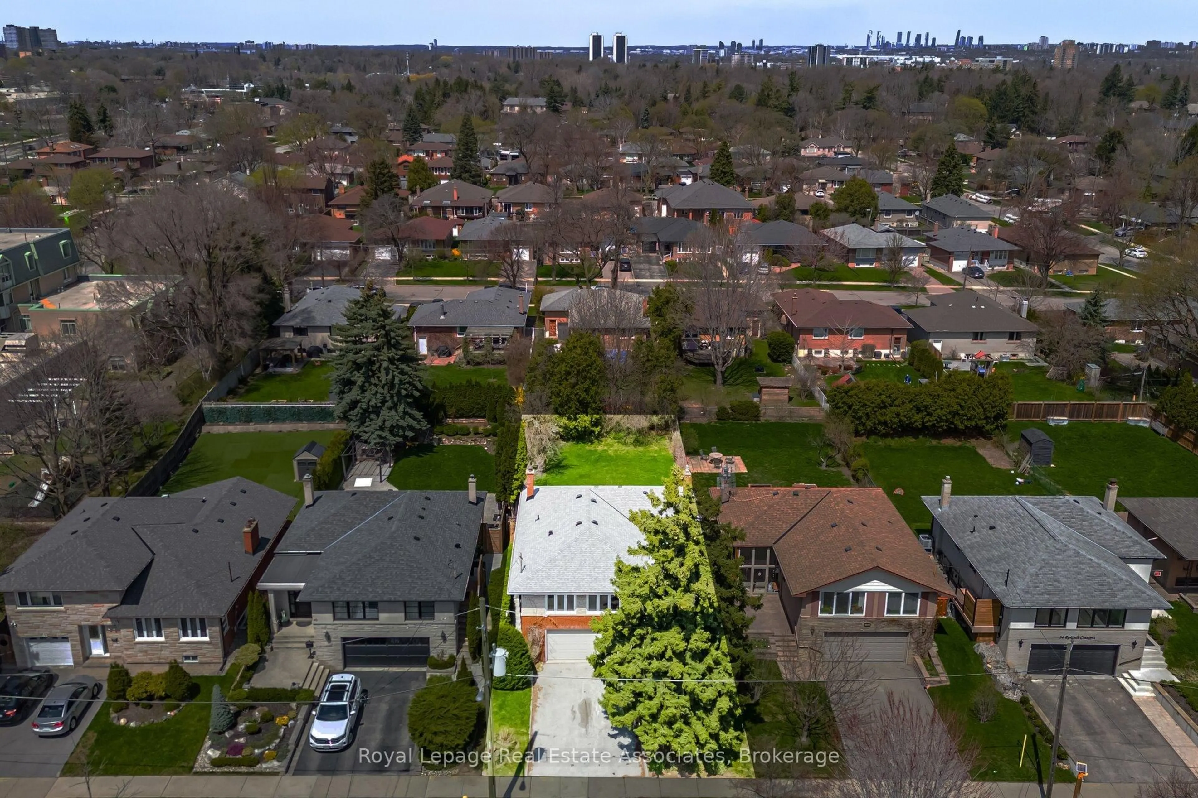 A pic from outside/outdoor area/front of a property/back of a property/a pic from drone, street for 38 Renault Cres, Toronto Ontario M9P 1J3