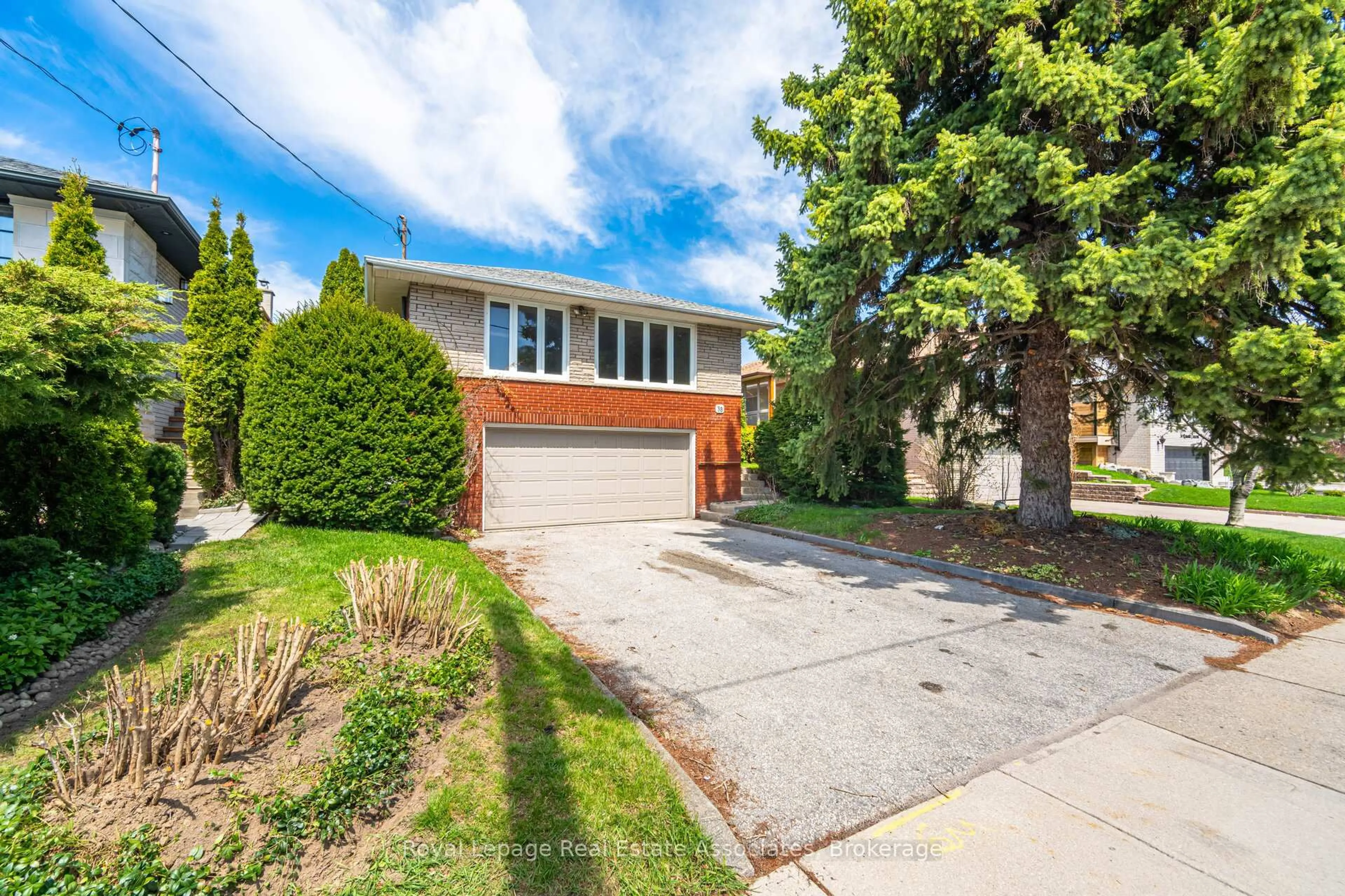 Home with brick exterior material, street for 38 Renault Cres, Toronto Ontario M9P 1J3