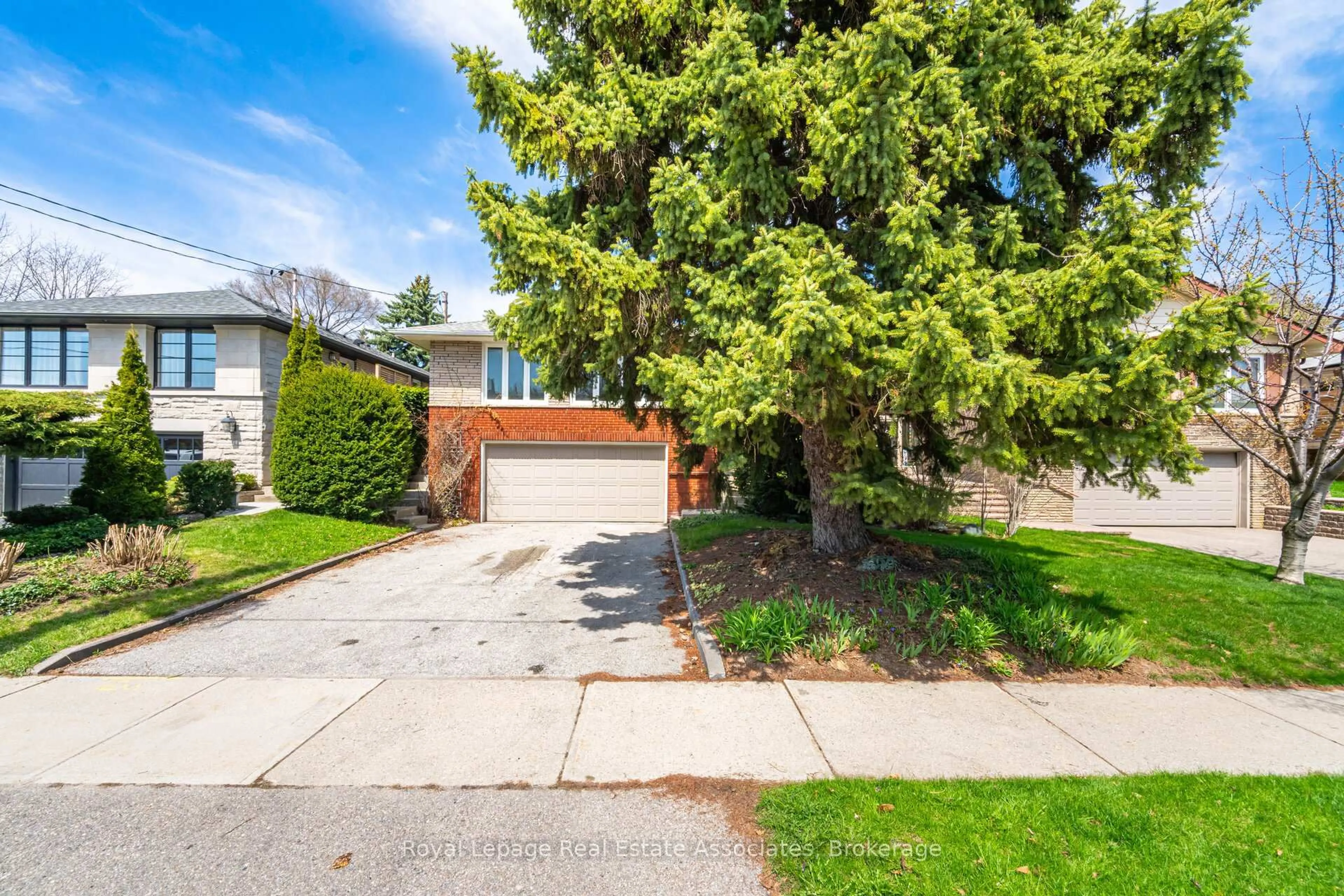 Home with brick exterior material, street for 38 Renault Cres, Toronto Ontario M9P 1J3