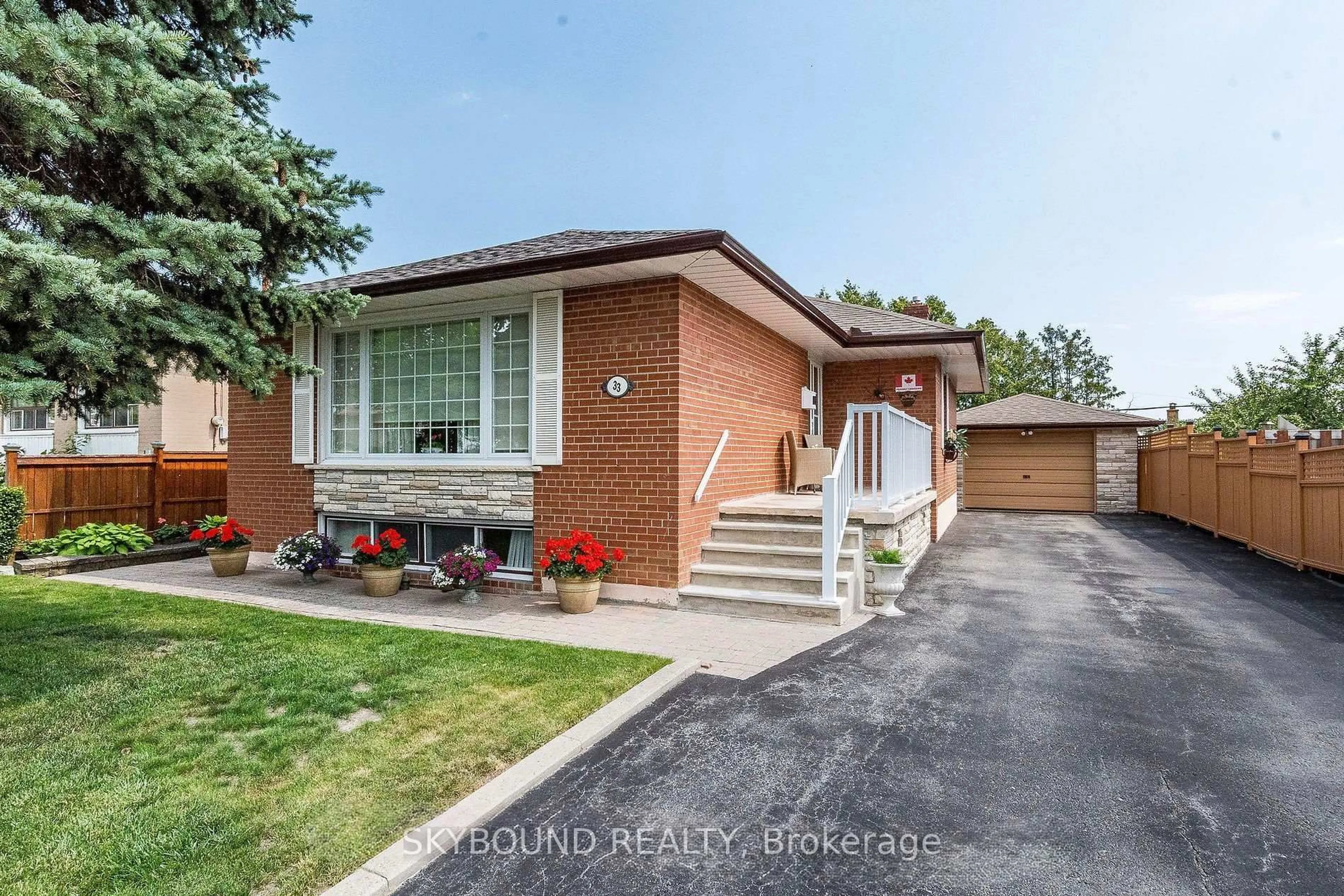 Home with brick exterior material, street for 33 Bradstock Rd, Toronto Ontario M9M 1M9