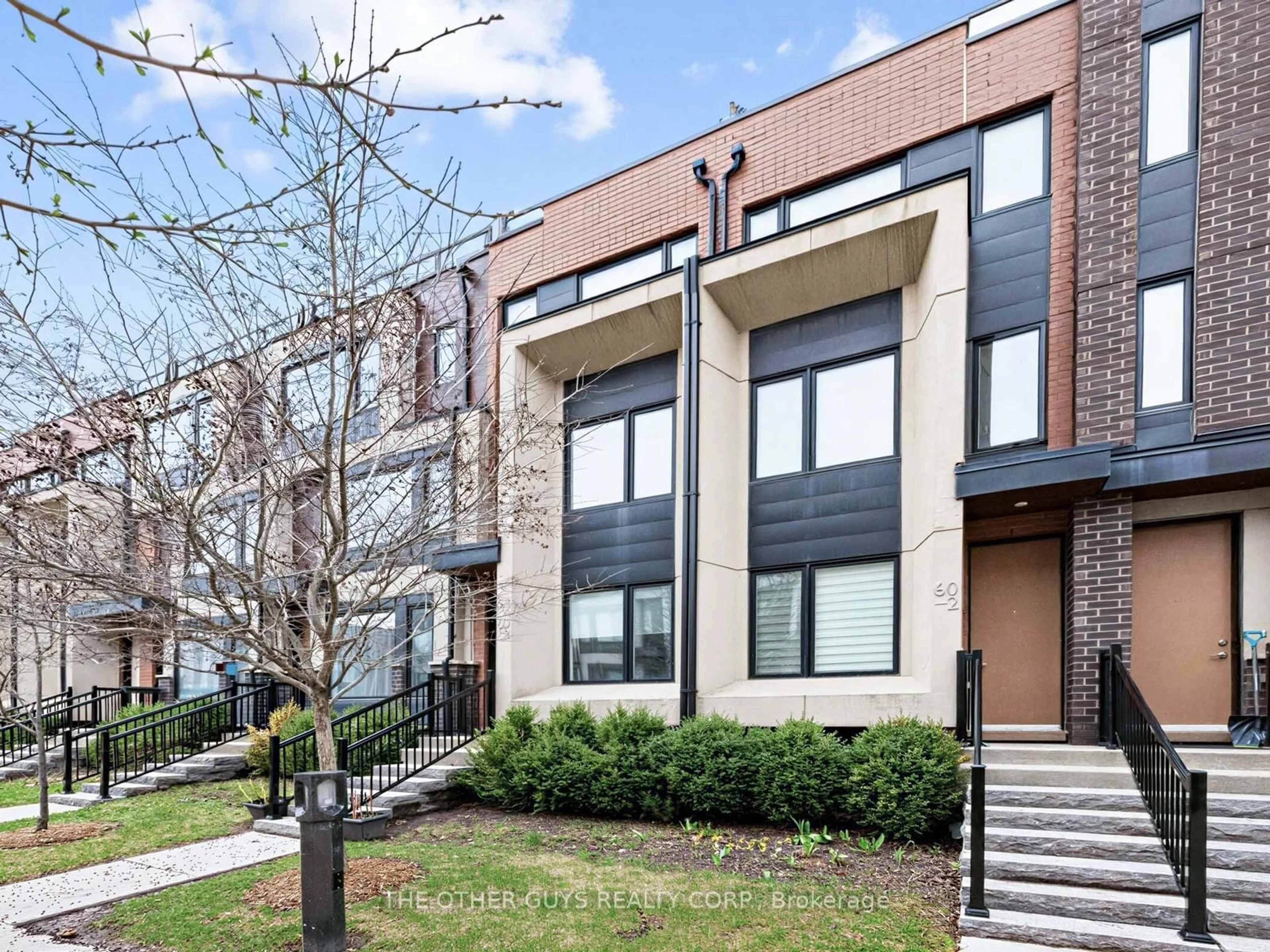 Home with brick exterior material, street for 60 Thomas Mulholland Dr #3, Toronto Ontario M3K 0A6