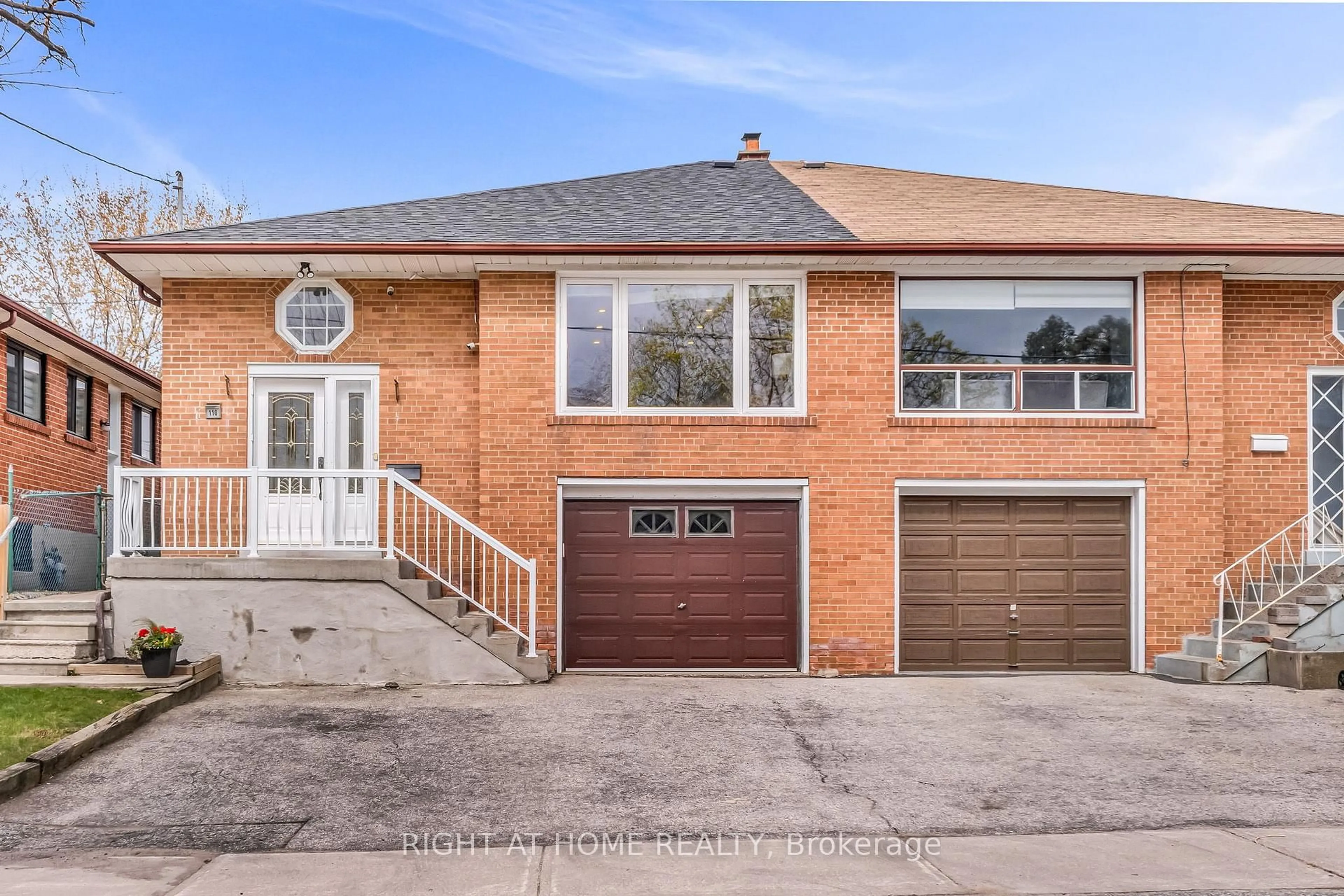 Home with brick exterior material, street for 110 Victory Dr, Toronto Ontario M3M 2J8