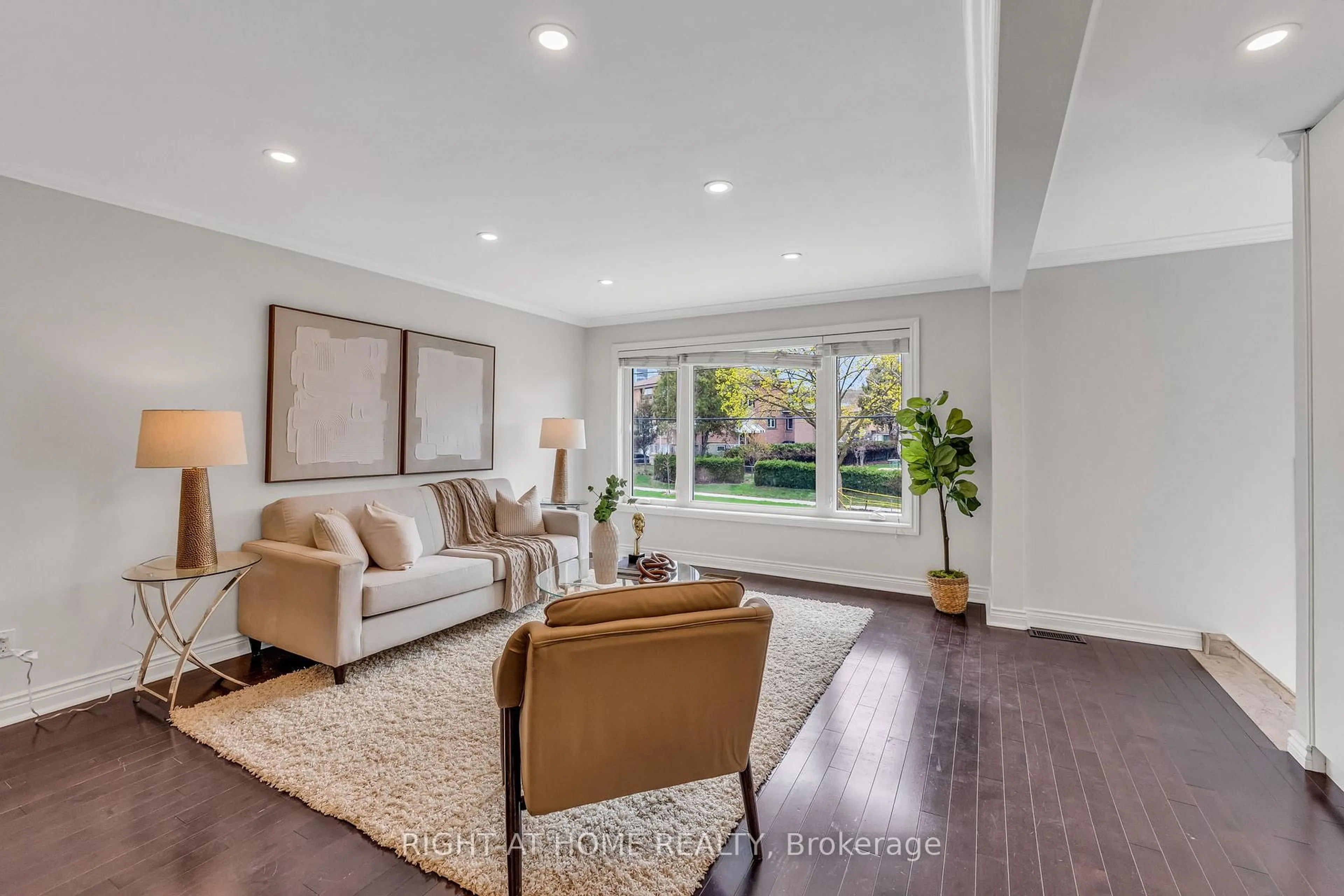 Living room with furniture, unknown for 110 Victory Dr, Toronto Ontario M3M 2J8