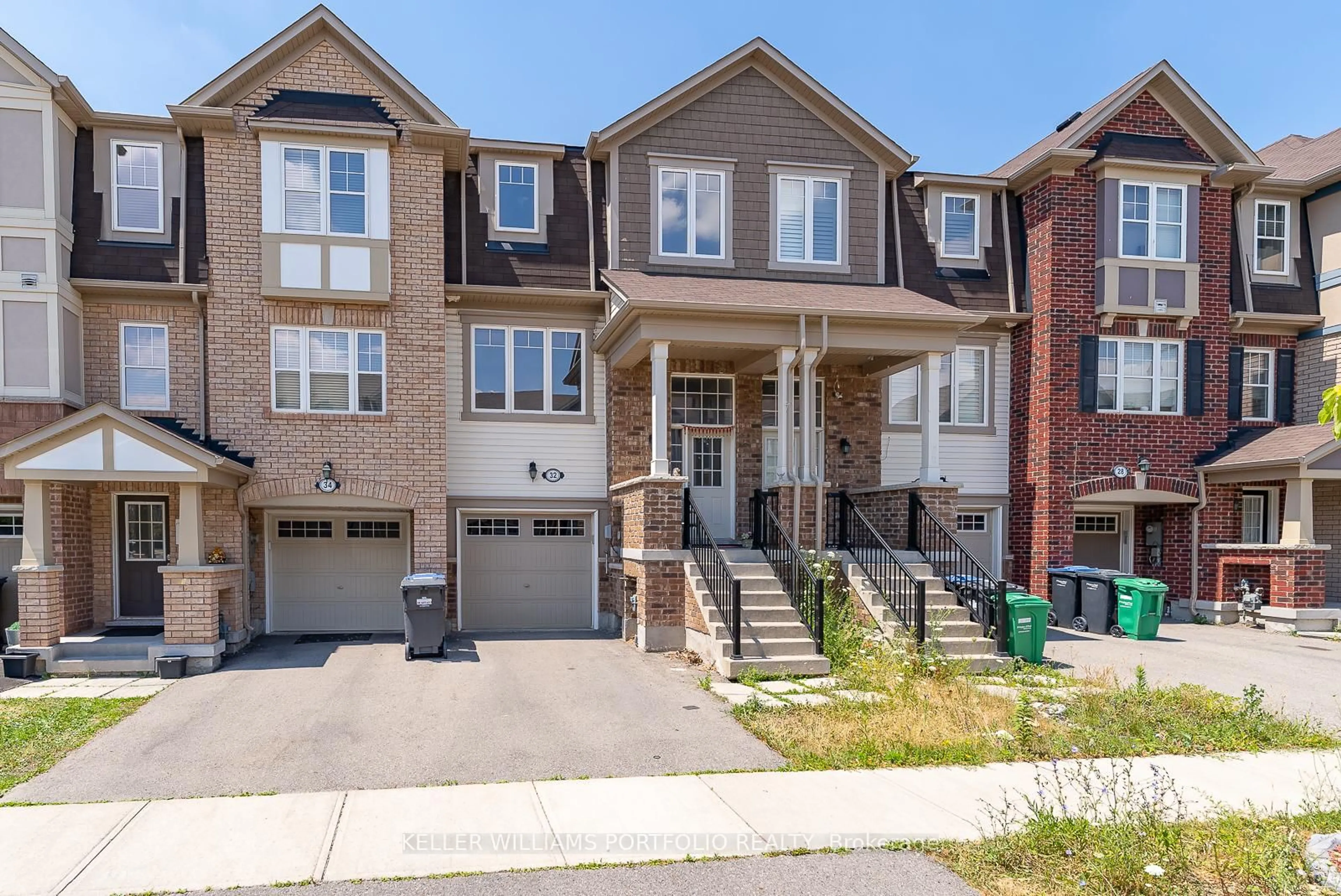 Home with brick exterior material, street for 32 Affleck Rd, Brampton Ontario L7A 3Z2