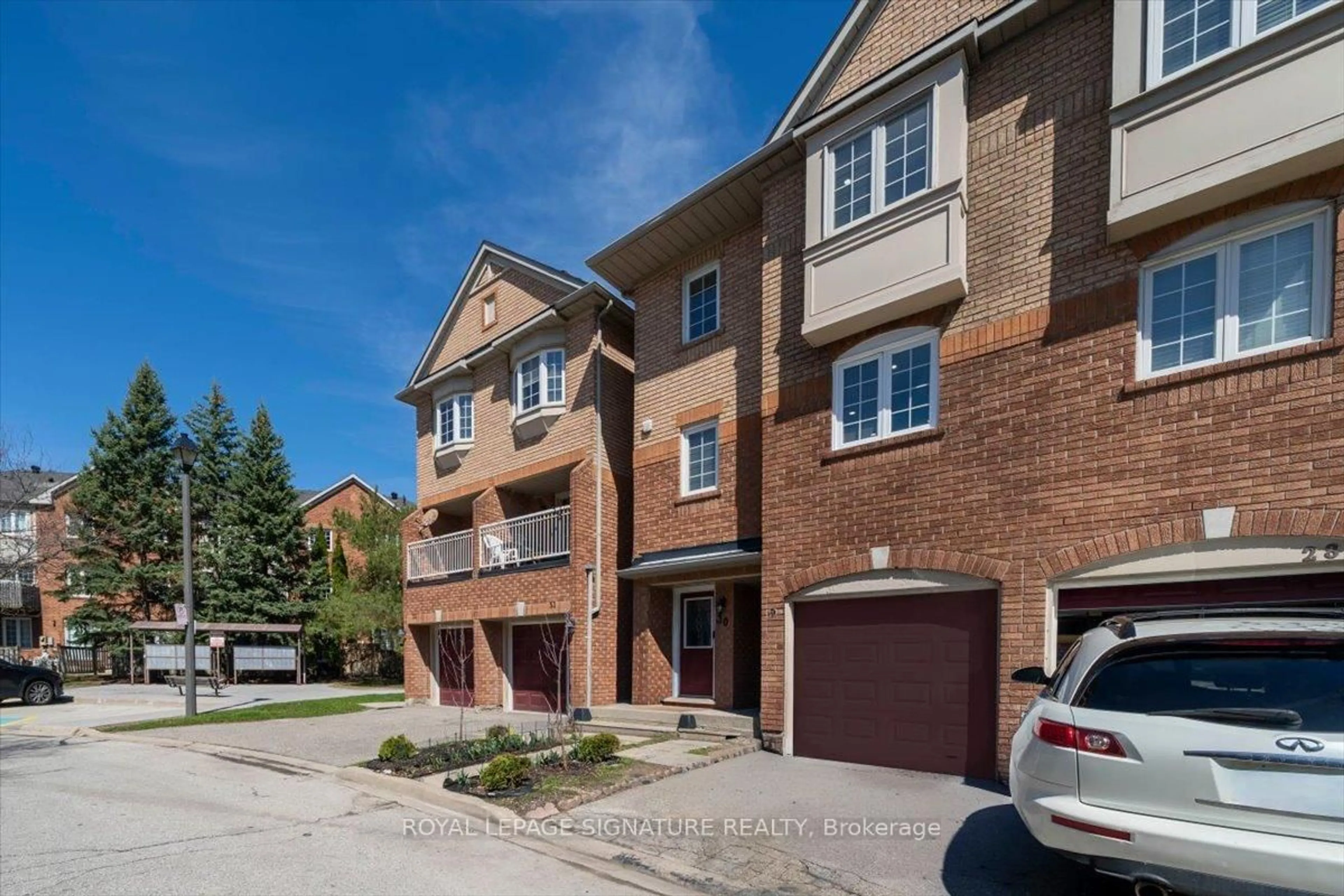 Home with brick exterior material, street for 6950 Tenth Line #29, Mississauga Ontario L5N 6Y1