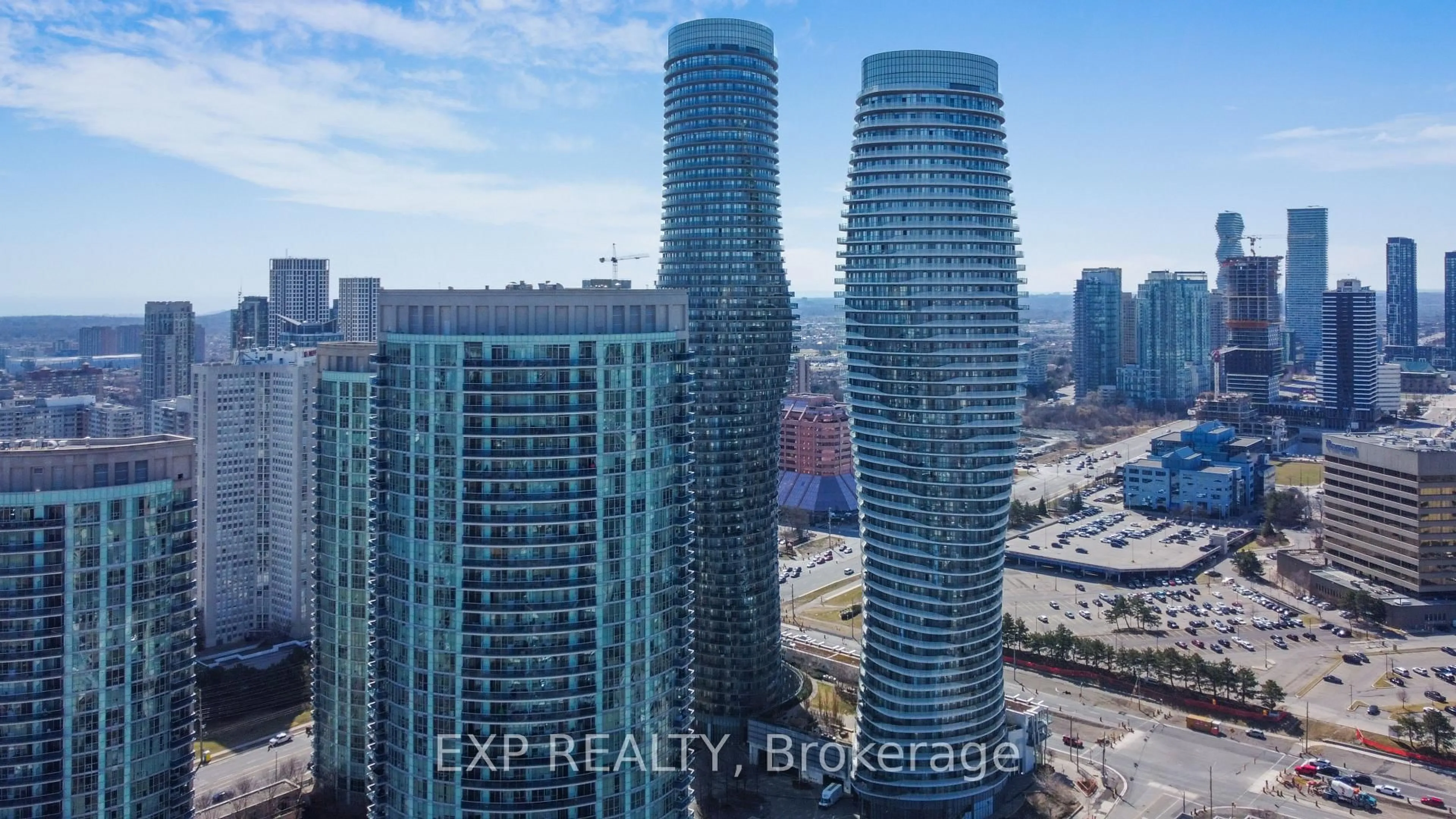 A pic from outside/outdoor area/front of a property/back of a property/a pic from drone, city buildings view from balcony for 80 Absolute Ave #3303, Mississauga Ontario L4Z 0A5