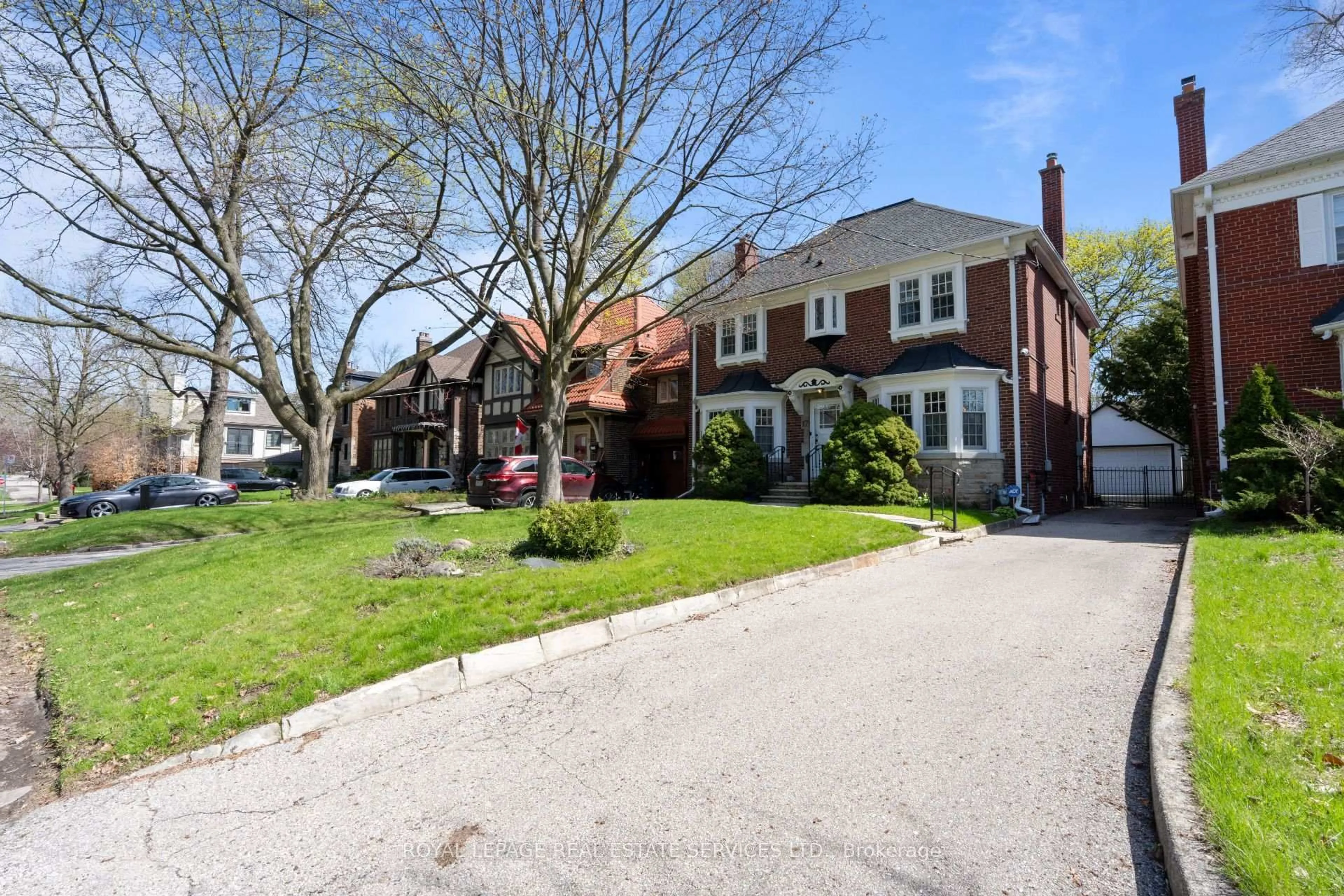 Home with brick exterior material, street for 17 Kings Lynn Rd, Toronto Ontario M8X 2M9