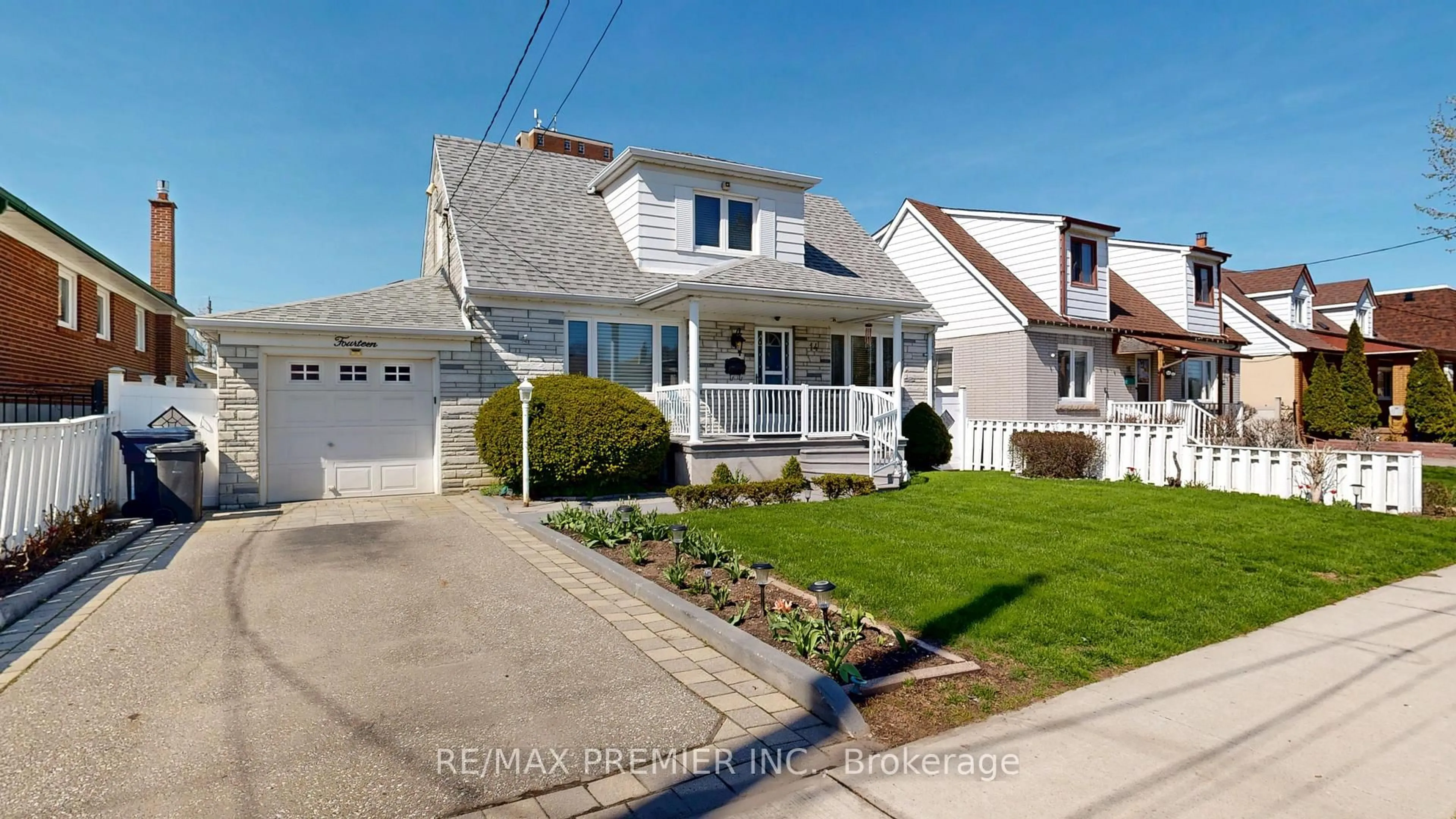 Home with vinyl exterior material, street for 14 Beckett Ave, Toronto Ontario M6L 2B1