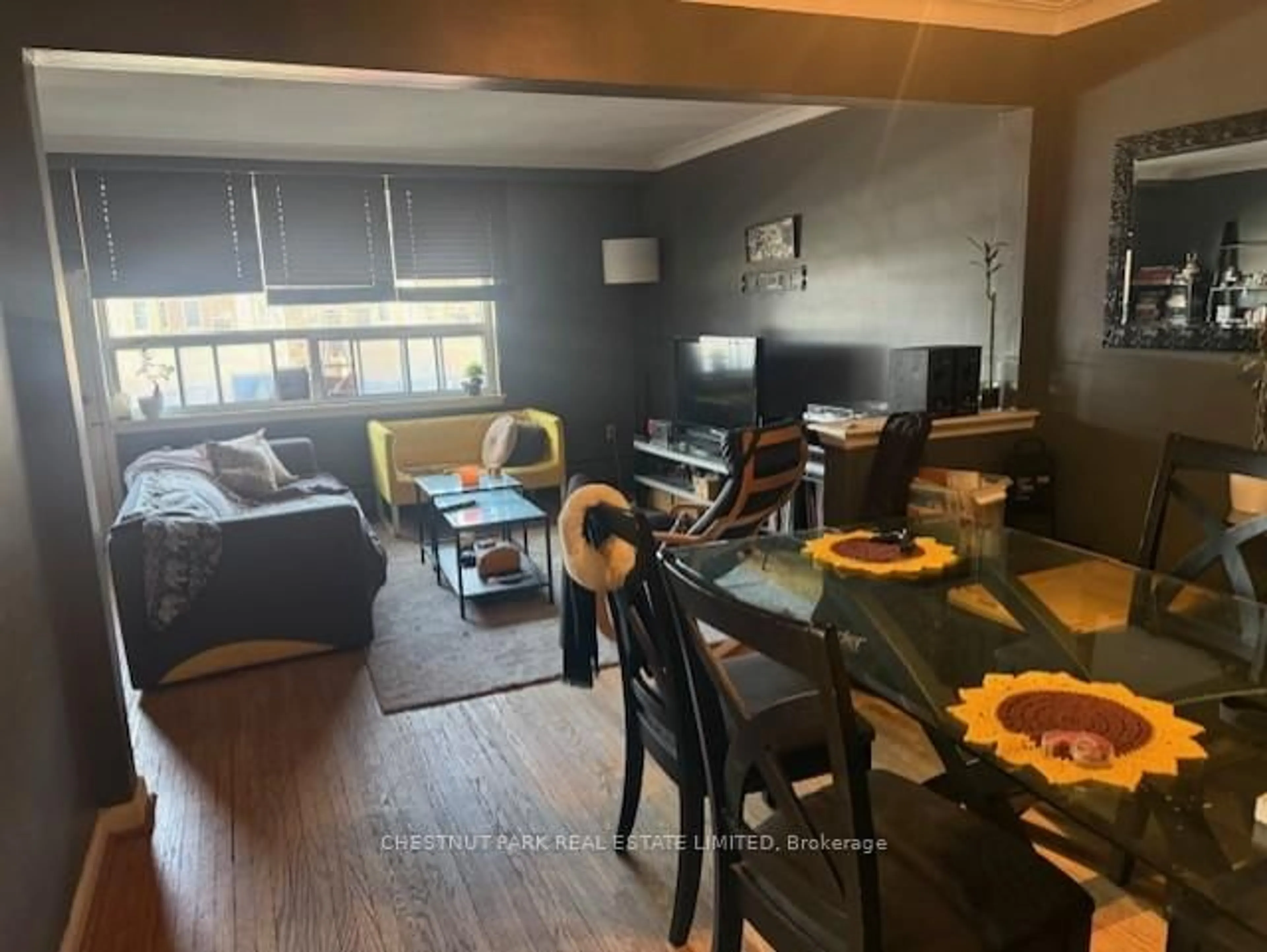 Living room with furniture, wood/laminate floor for 757 Lawrence Ave, Toronto Ontario M6A 1B7