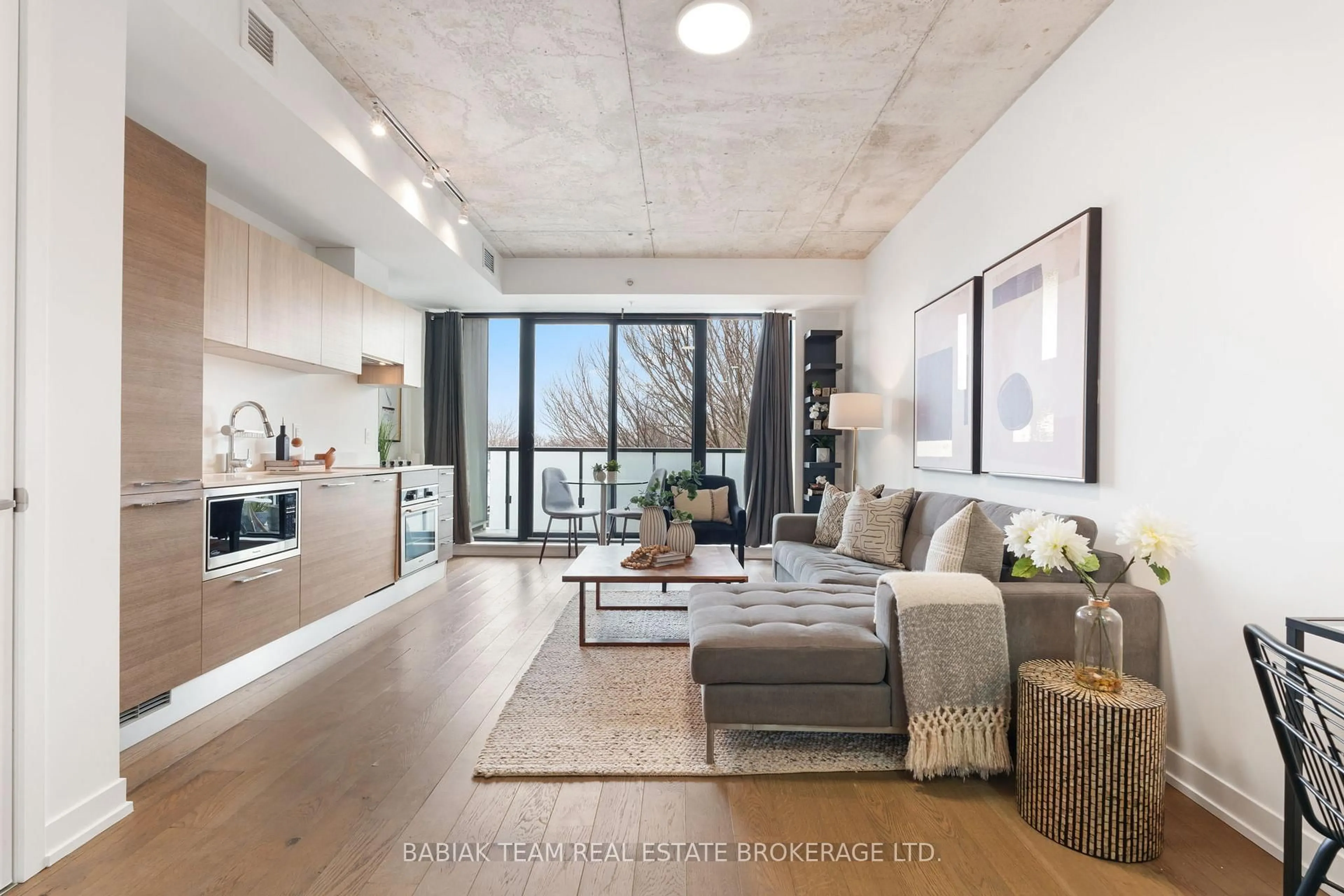 Living room with furniture, cement floor for 530 Indian Grve #401, Toronto Ontario M6P 0B3