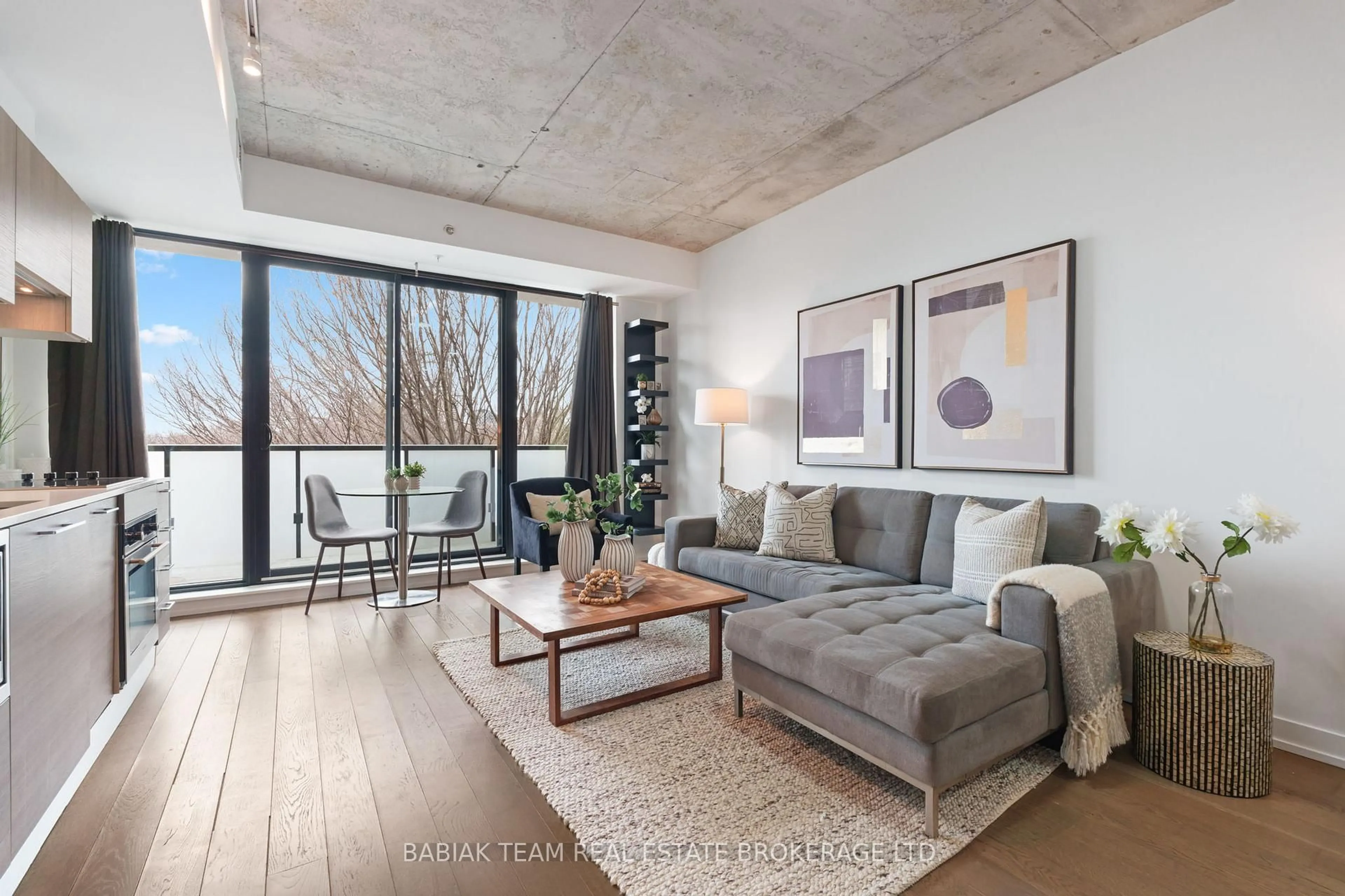 Living room with furniture, cement floor for 530 Indian Grve #401, Toronto Ontario M6P 0B3