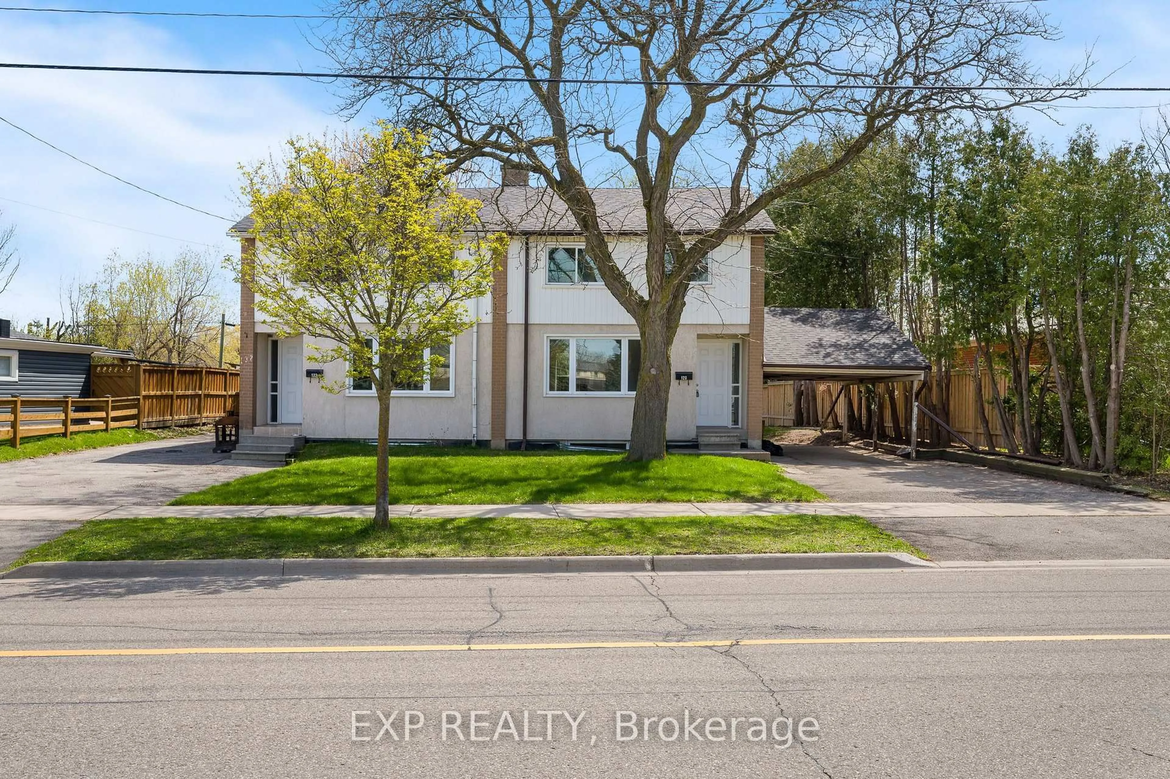 A pic from outside/outdoor area/front of a property/back of a property/a pic from drone, street for 128 Heslop Rd, Milton Ontario L9T 1B4
