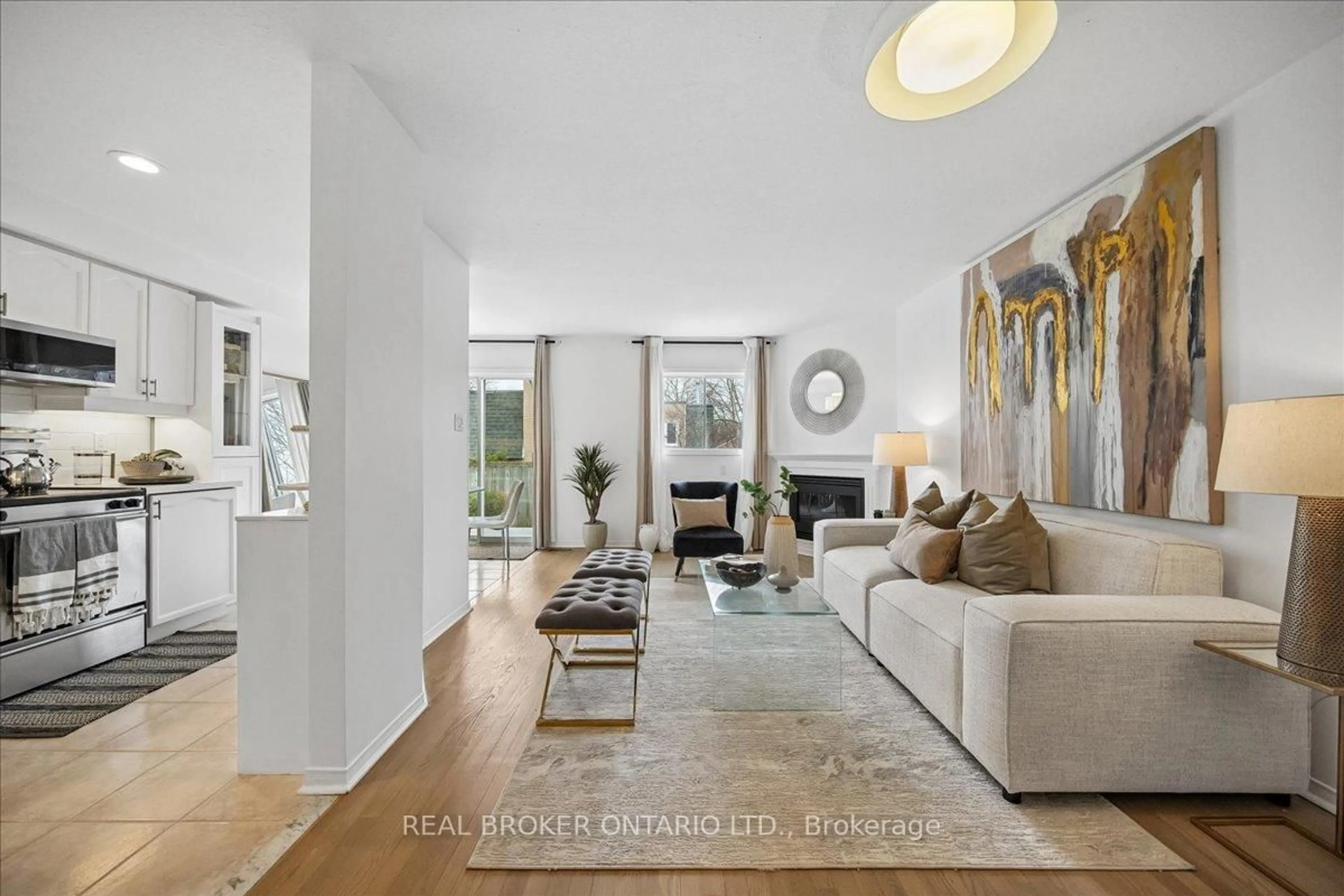 Living room with furniture, unknown for 1385 Lakeshore Rd #Unit 7, Mississauga Ontario L5J 4T6