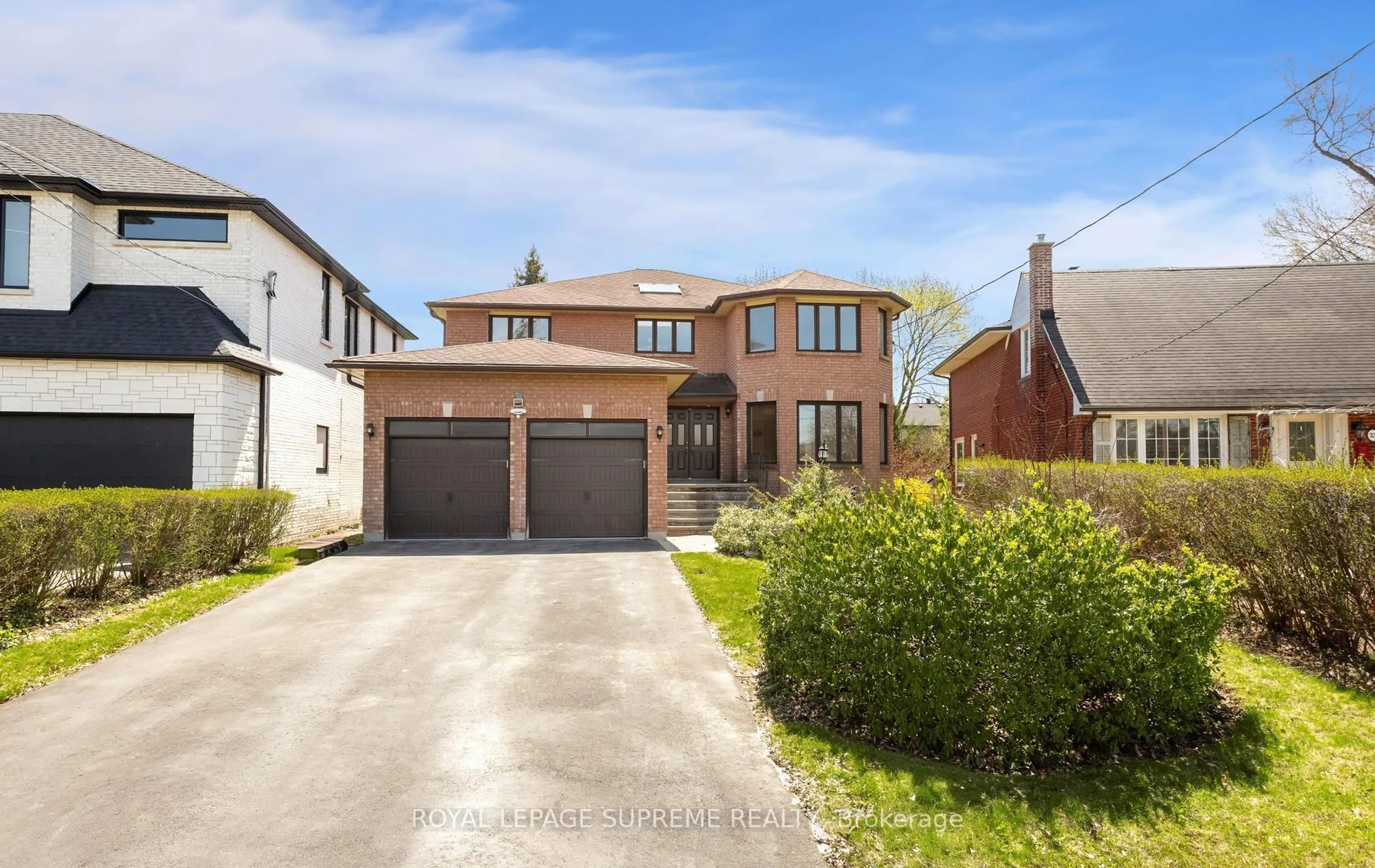 Home with brick exterior material, street for 31 Donalbert Rd, Toronto Ontario M9B 2E9