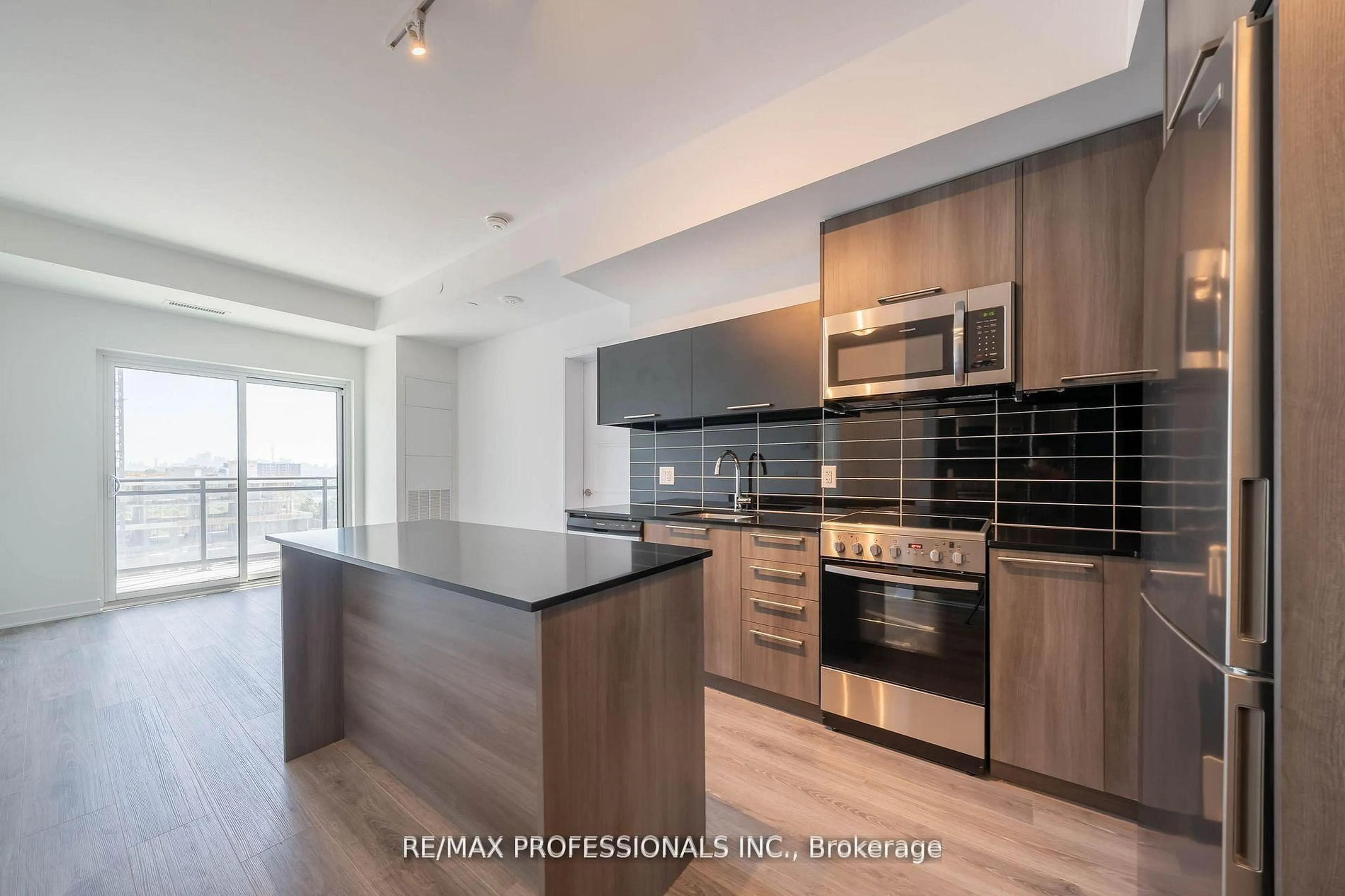Open concept kitchen, unknown for 25 Neighbourhood Lane #901, Toronto Ontario M9Y 0C4