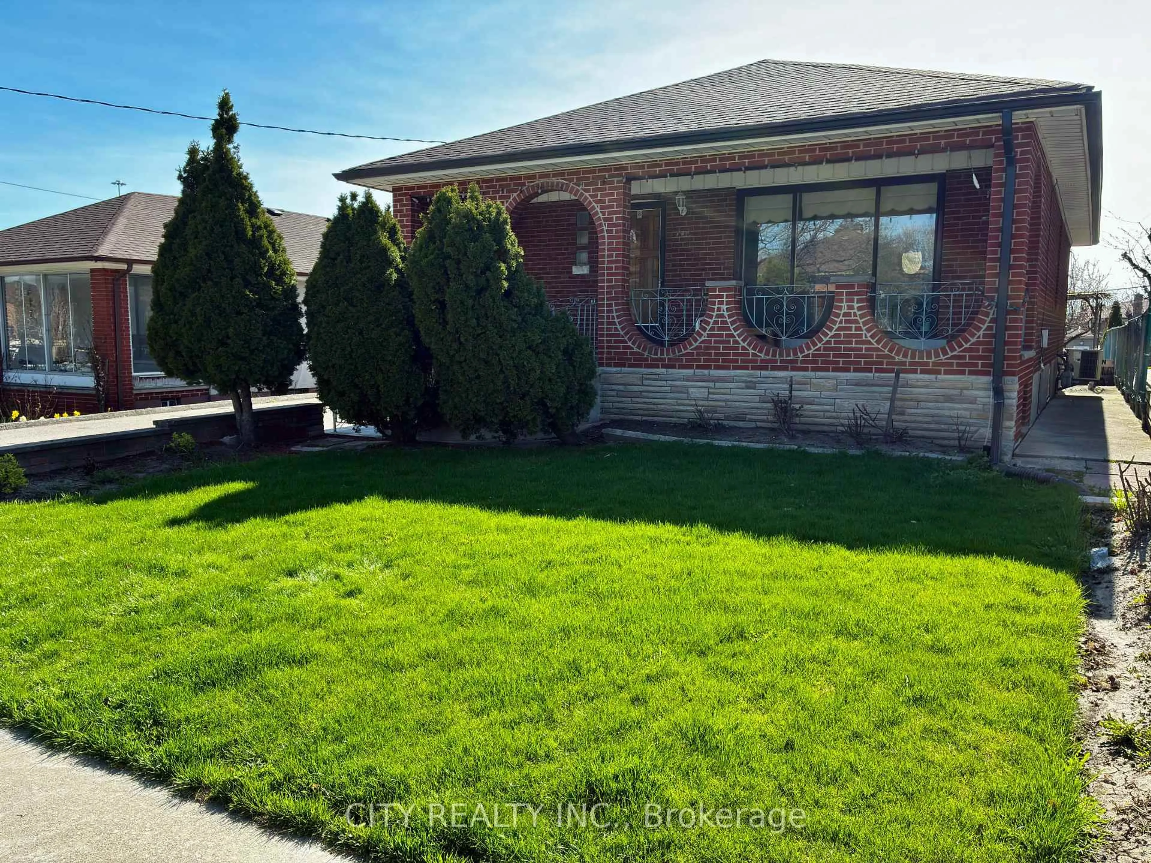 Home with brick exterior material, street for 40 Montana Ave, Toronto Ontario M3M 1B6