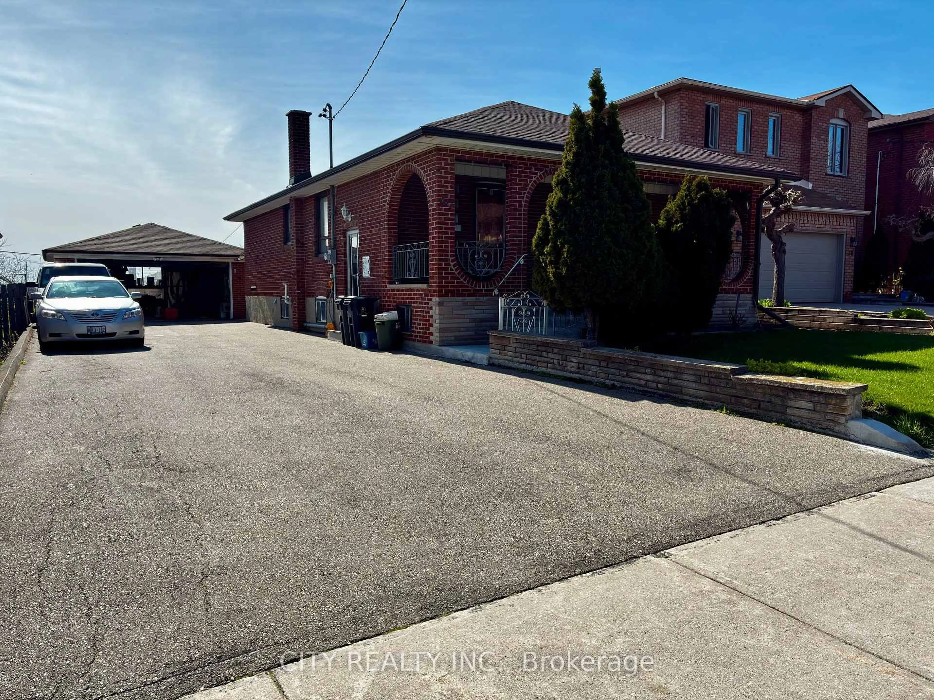 Home with brick exterior material, street for 40 Montana Ave, Toronto Ontario M3M 1B6