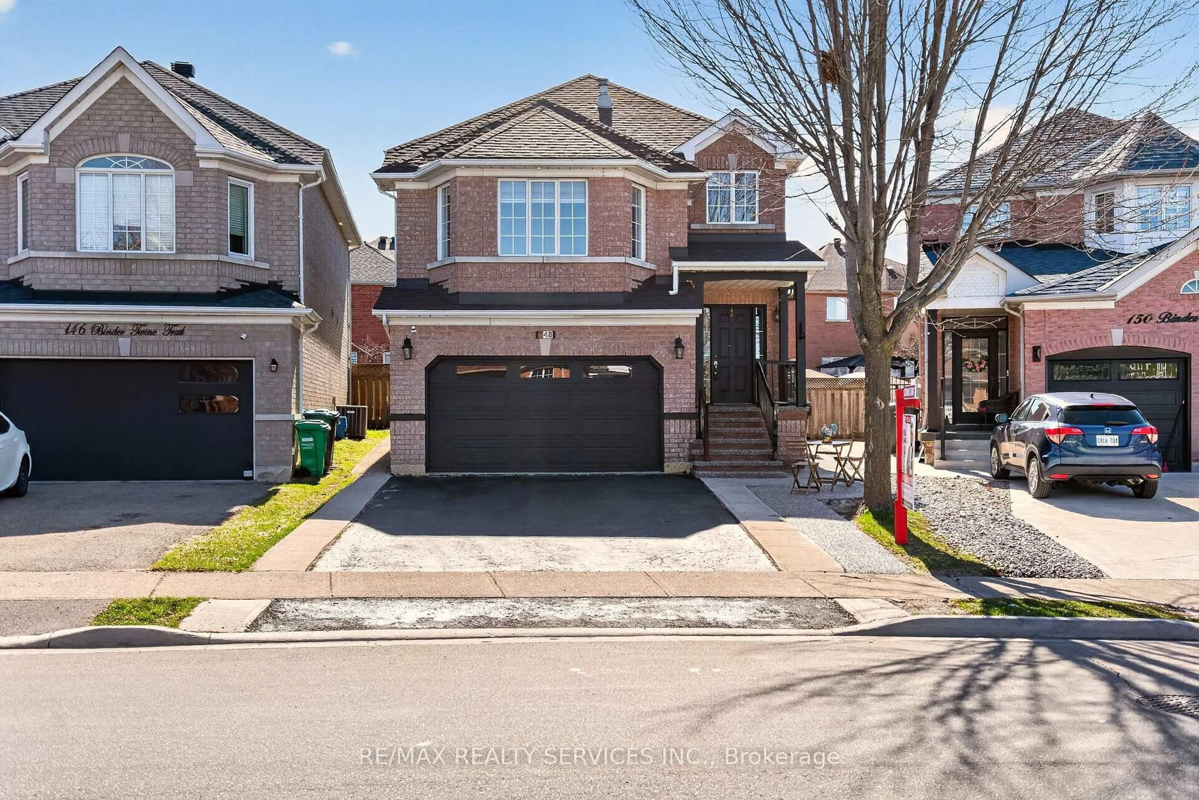 Home with brick exterior material, street for 148 Binder Twine Tr, Brampton Ontario L6X 4V6