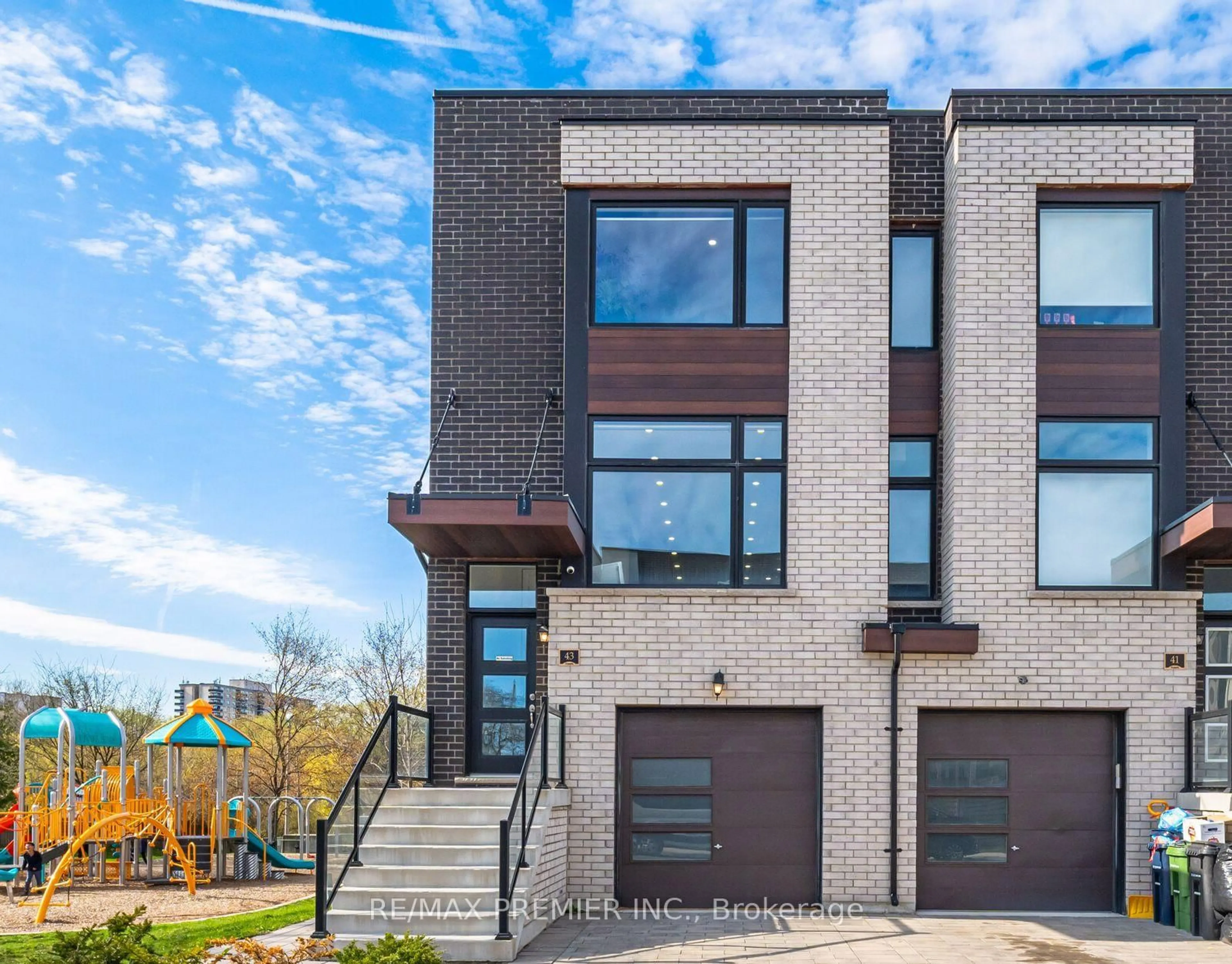 Home with brick exterior material, street for 43 Wild Rose Gdns, Toronto Ontario M6L 0A5