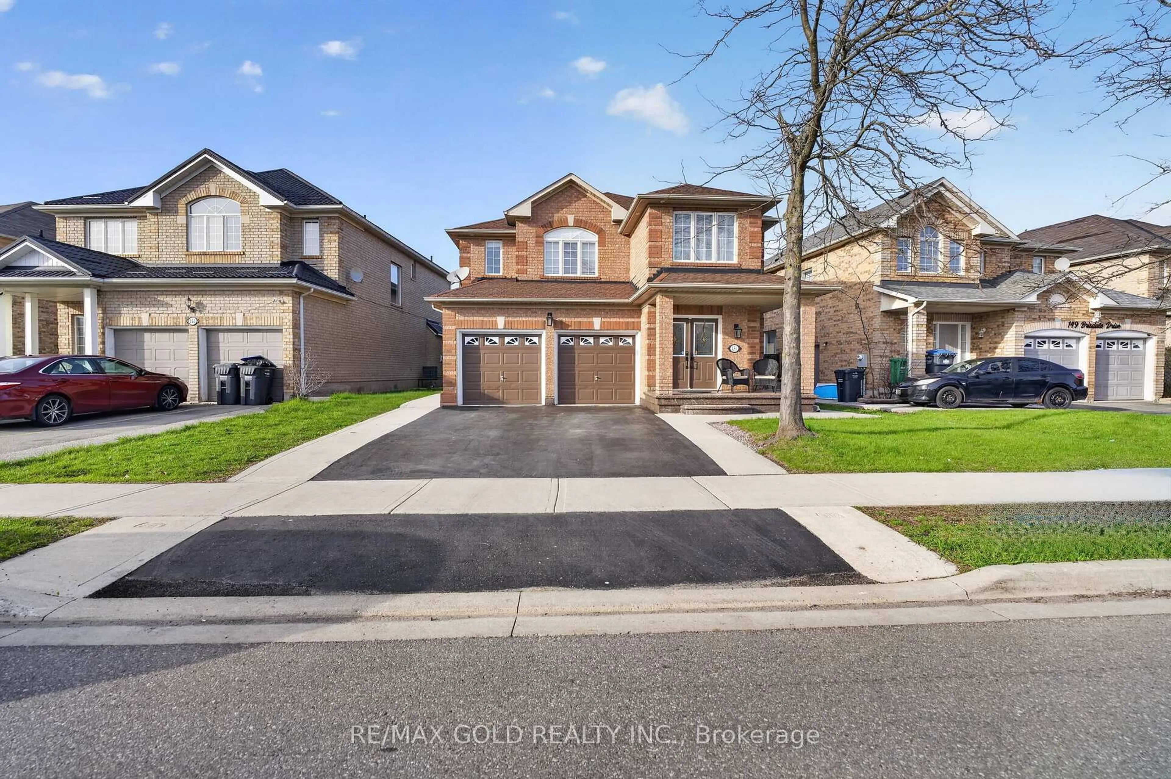Home with brick exterior material, street for 151 Brisdale Dr, Brampton Ontario L7A 2Y8
