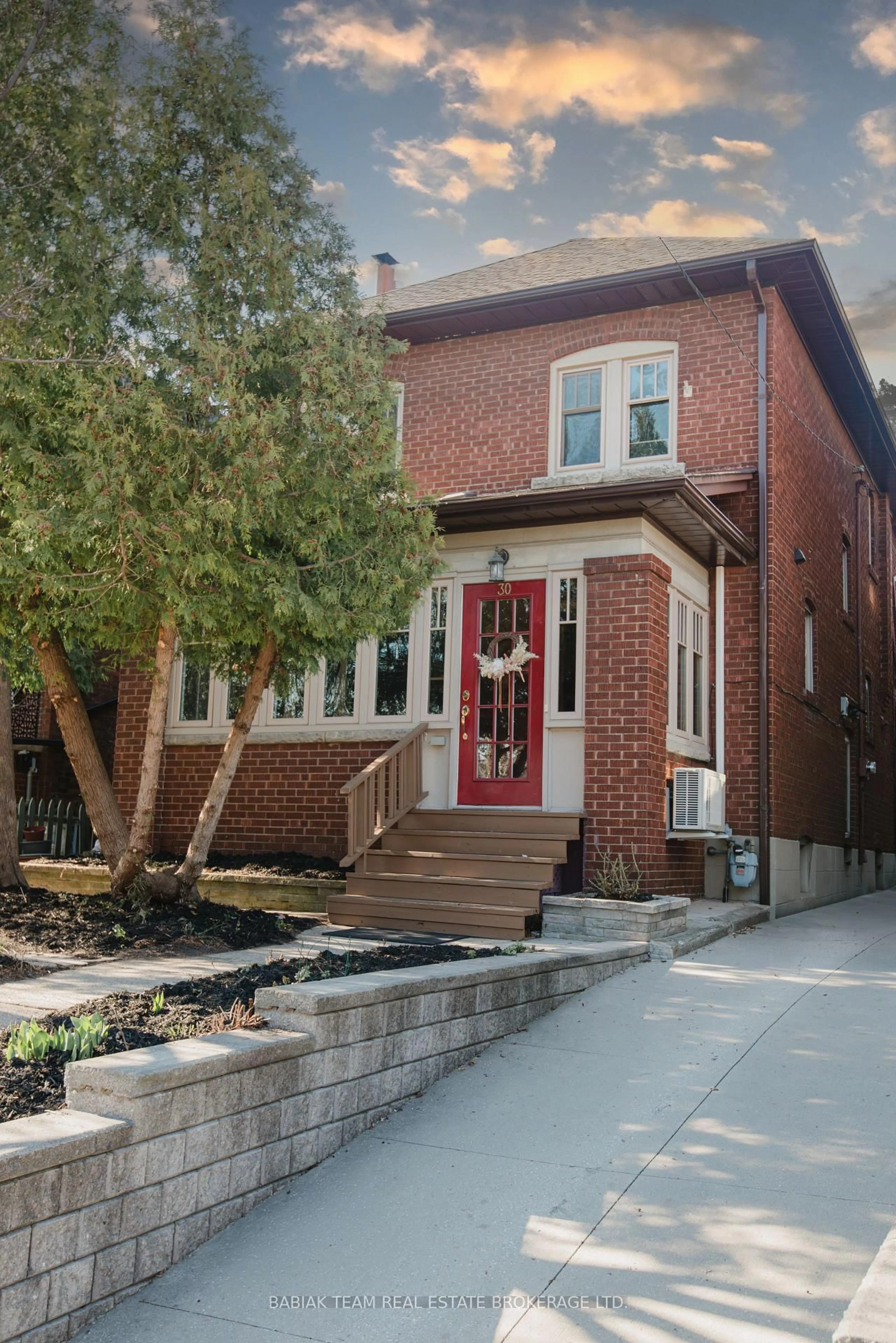 Home with brick exterior material, street for 30 Woodside Ave, Toronto Ontario M6P 1L7