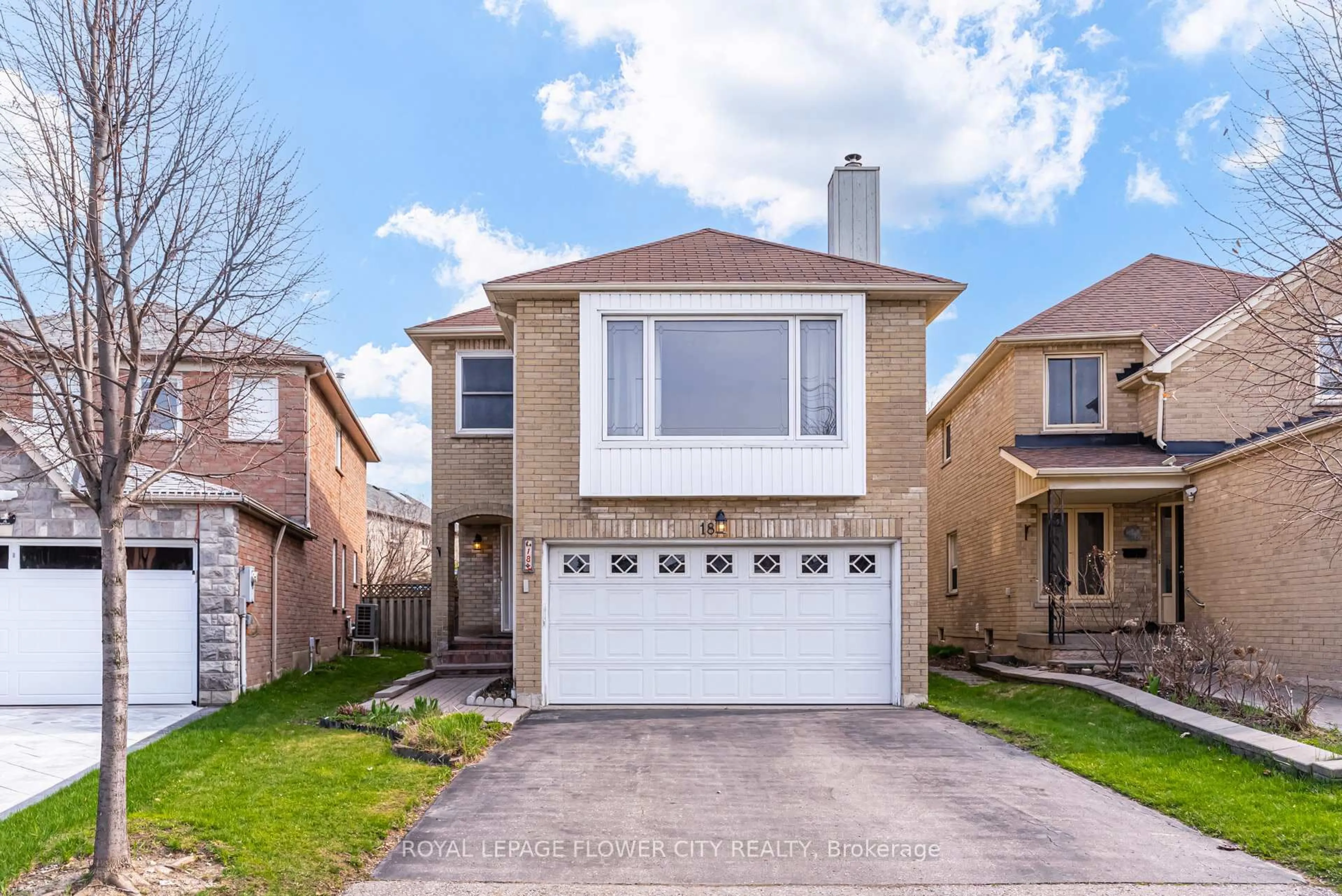 Home with brick exterior material, street for 18 Nature Crt, Brampton Ontario L6S 5T8