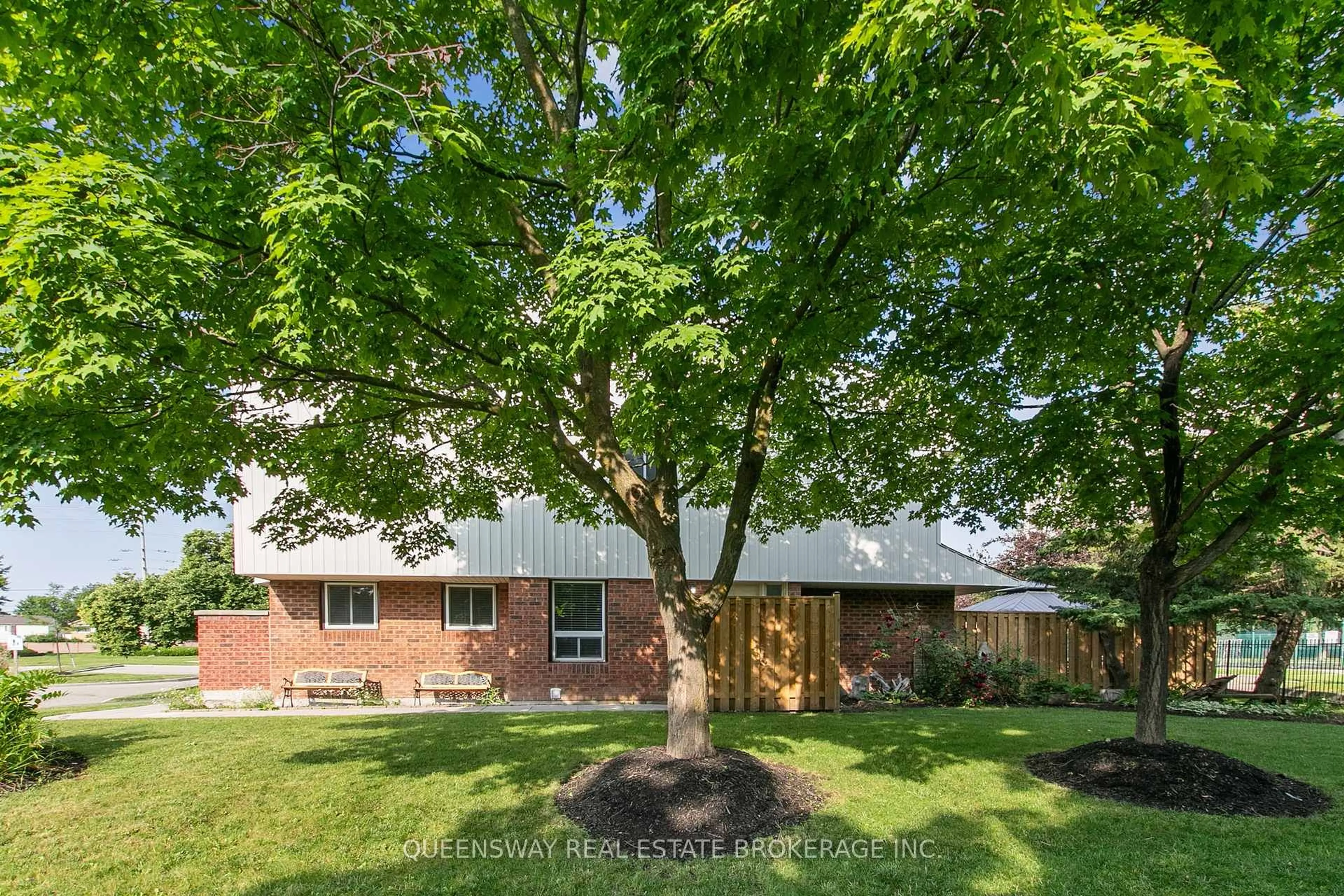 A pic from outside/outdoor area/front of a property/back of a property/a pic from drone, street for 6520 Corfu Rd #1, Mississauga Ontario L5N 3B4