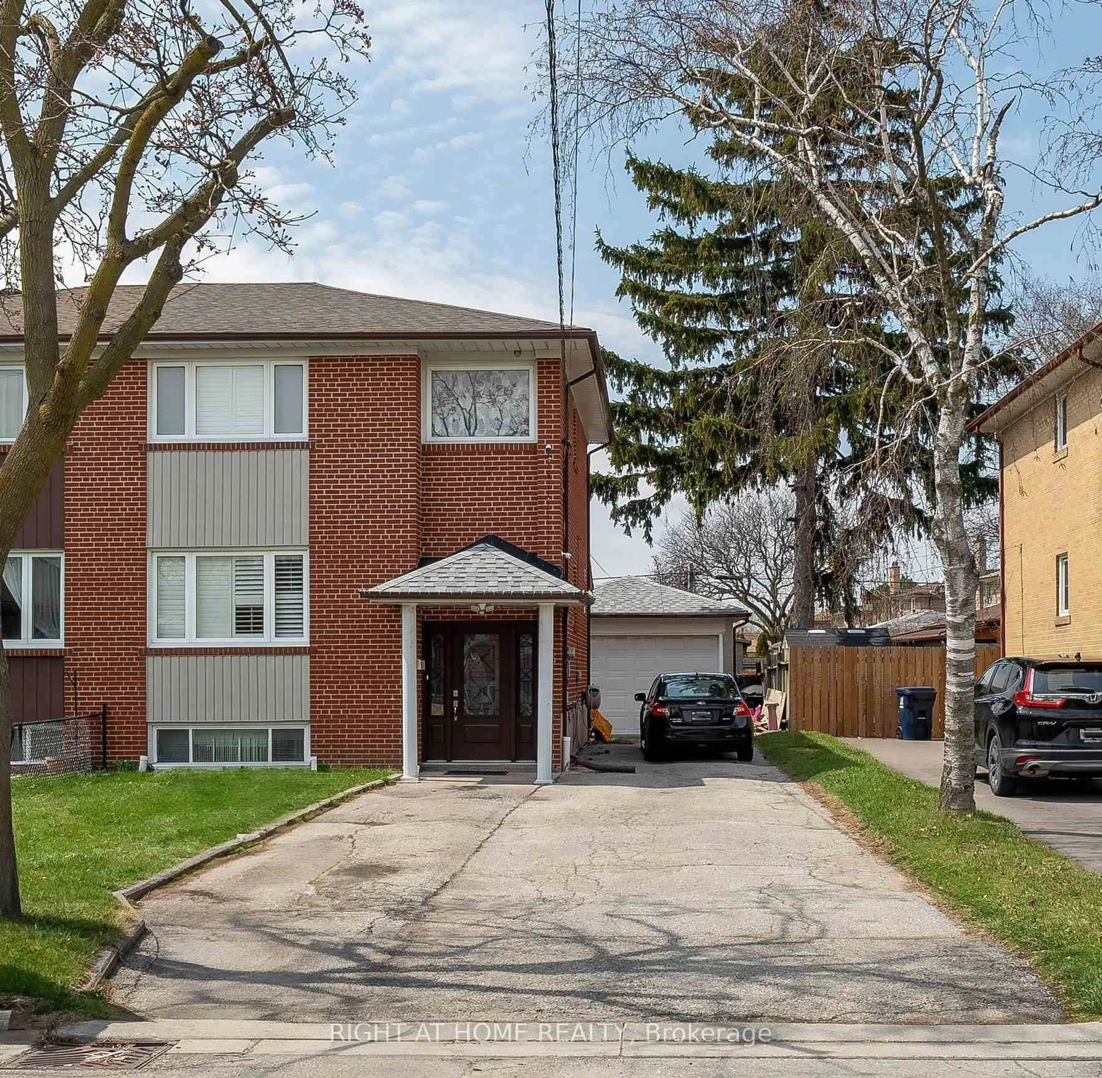 Home with brick exterior material, street for 76 Habitant Dr, Toronto Ontario M9M 2P2