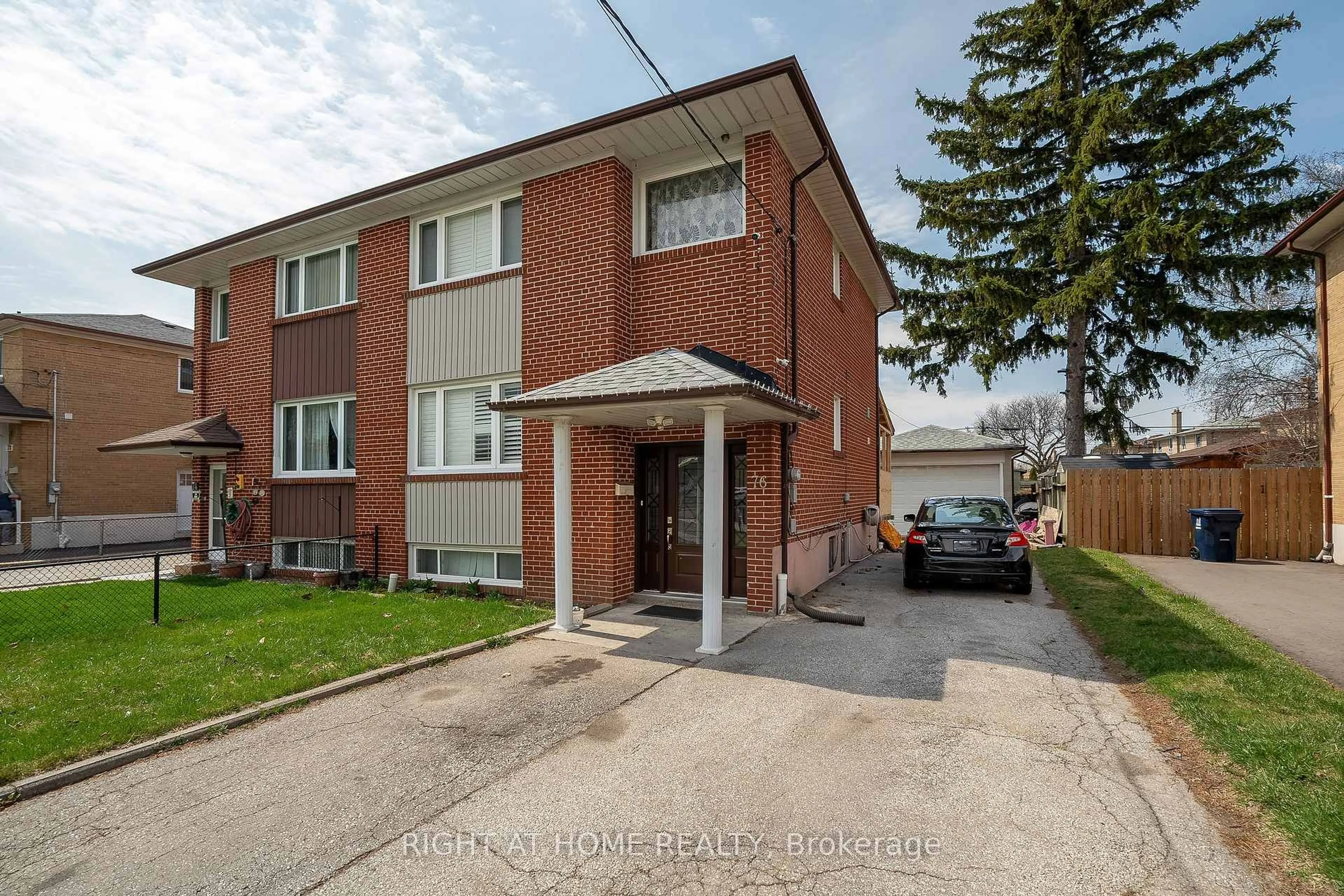 Home with brick exterior material, street for 76 Habitant Dr, Toronto Ontario M9M 2P2