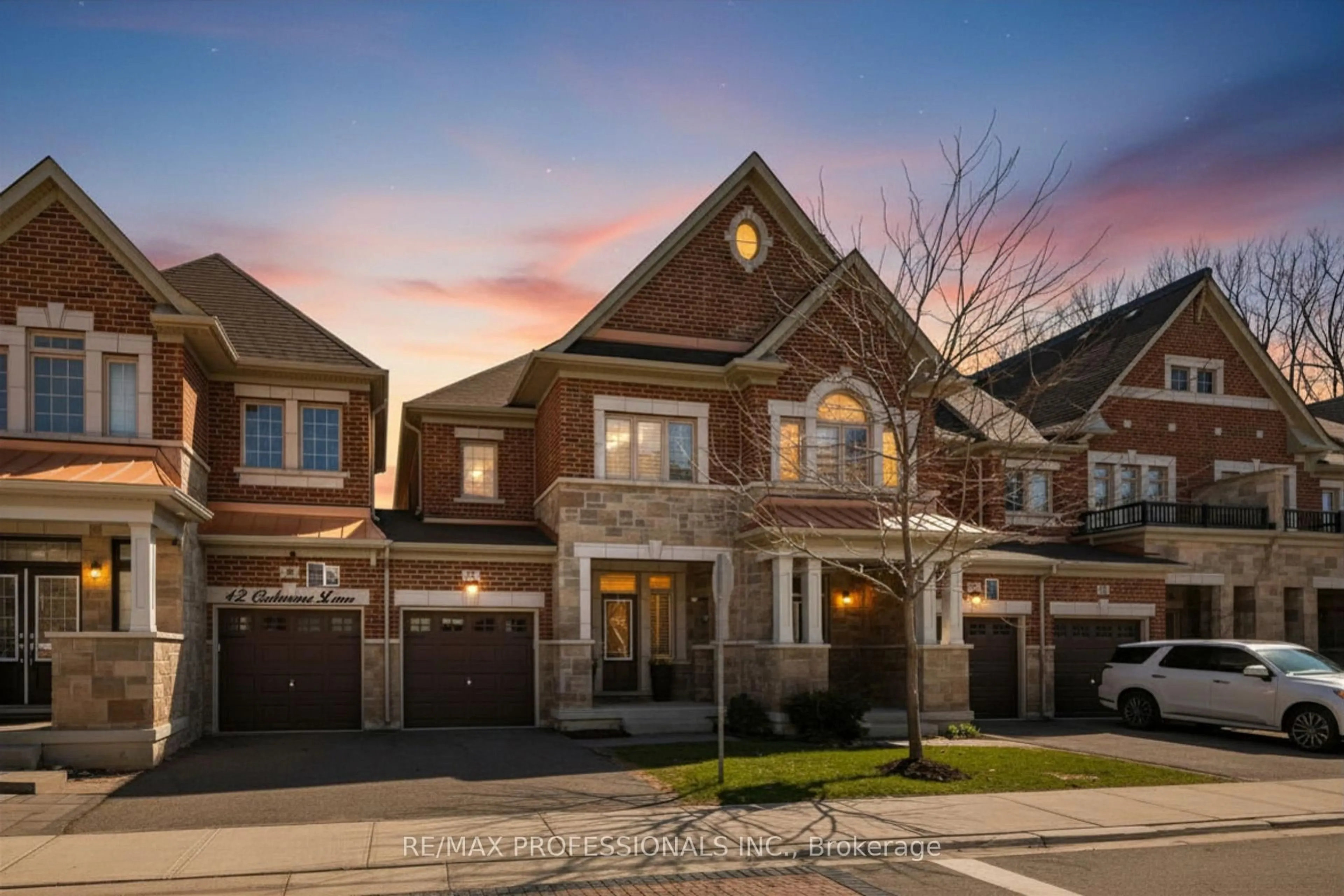 Home with brick exterior material, street for 44 Oakmore Lane, Brampton Ontario L6Y 6H5