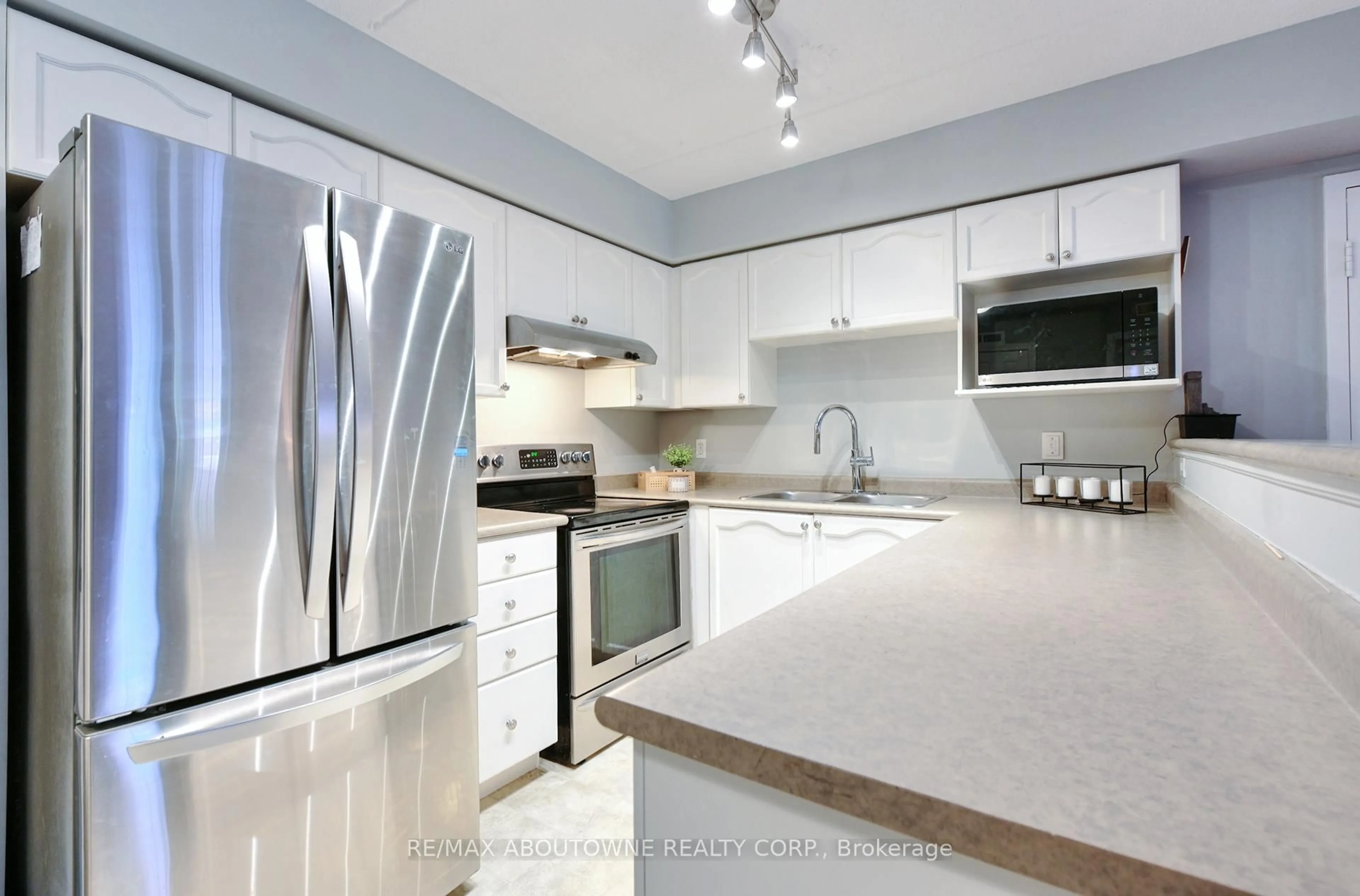 Contemporary kitchen, ceramic/tile floor for 1470 Bishops Gate #104, Oakville Ontario L6M 4N2