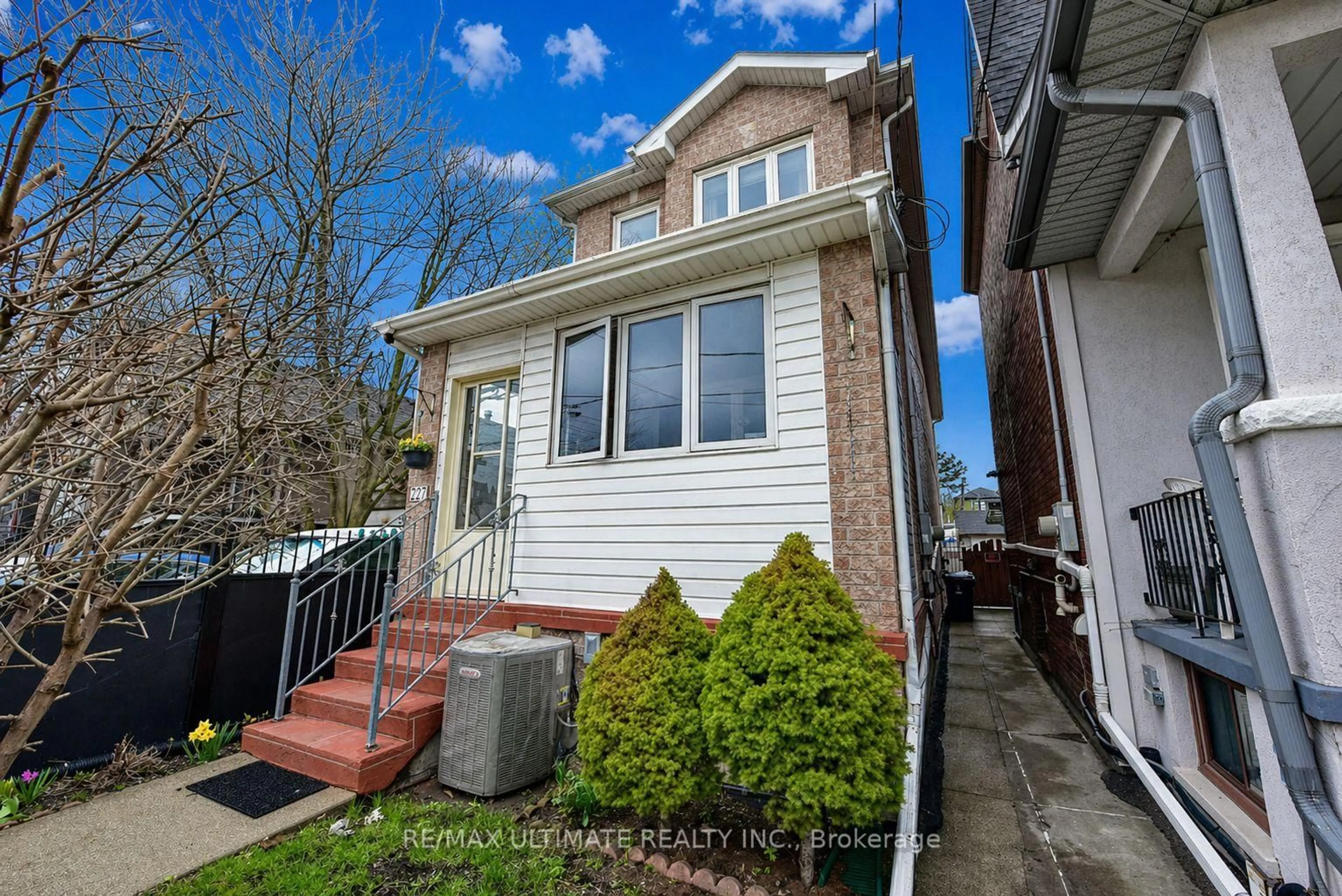 Home with vinyl exterior material, street for 227 Earlscourt Ave, Toronto Ontario M6E 4B4