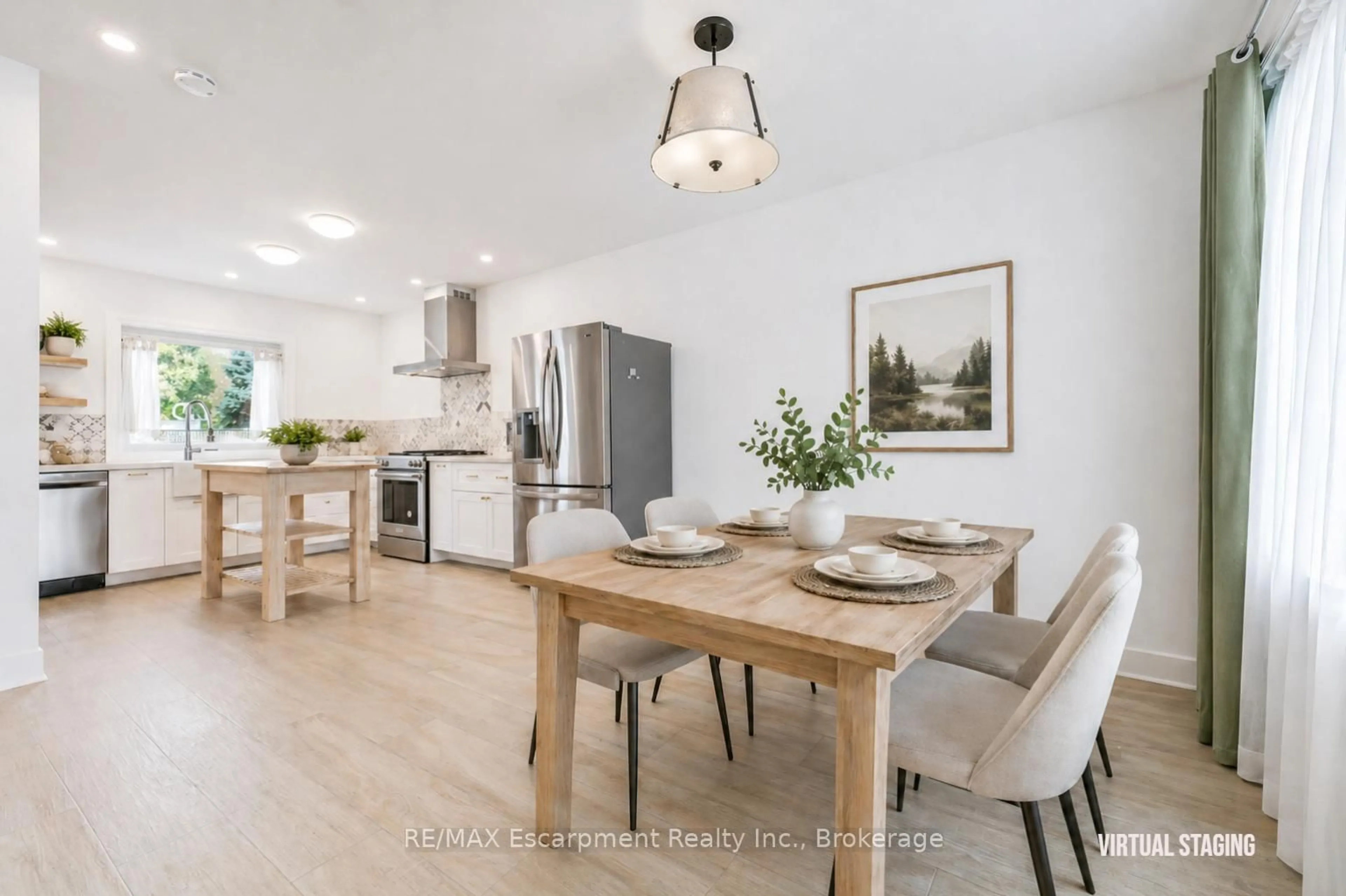 Open concept kitchen, wood/laminate floor for 227 Martindale Ave, Oakville Ontario L6H 4K2