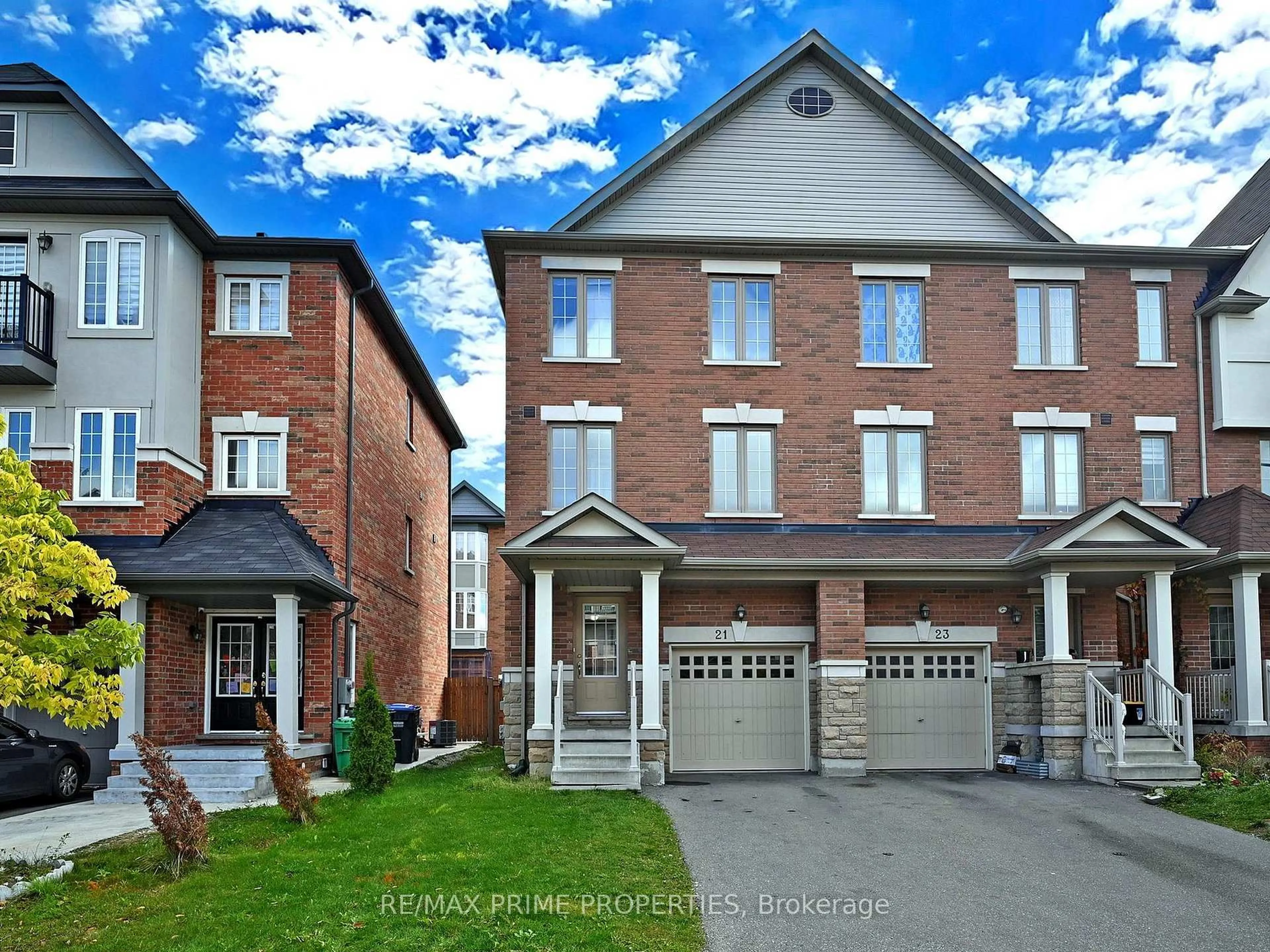 Home with brick exterior material, street for 21 Sprucewood Rd, Brampton Ontario L6Z 0J0