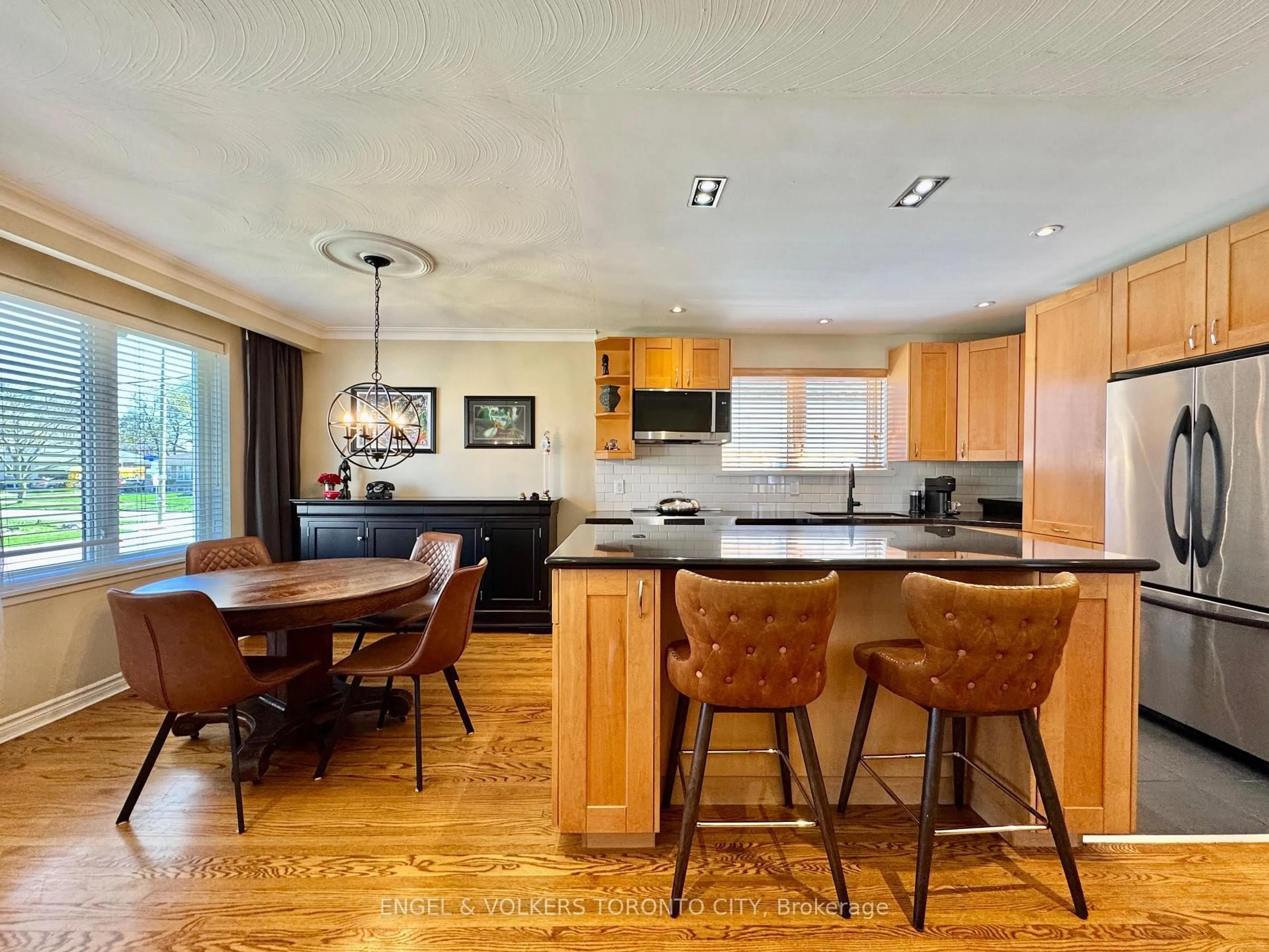 Open concept kitchen, wood/laminate floor for 41 Paragon Rd, Toronto Ontario M9R 1J9