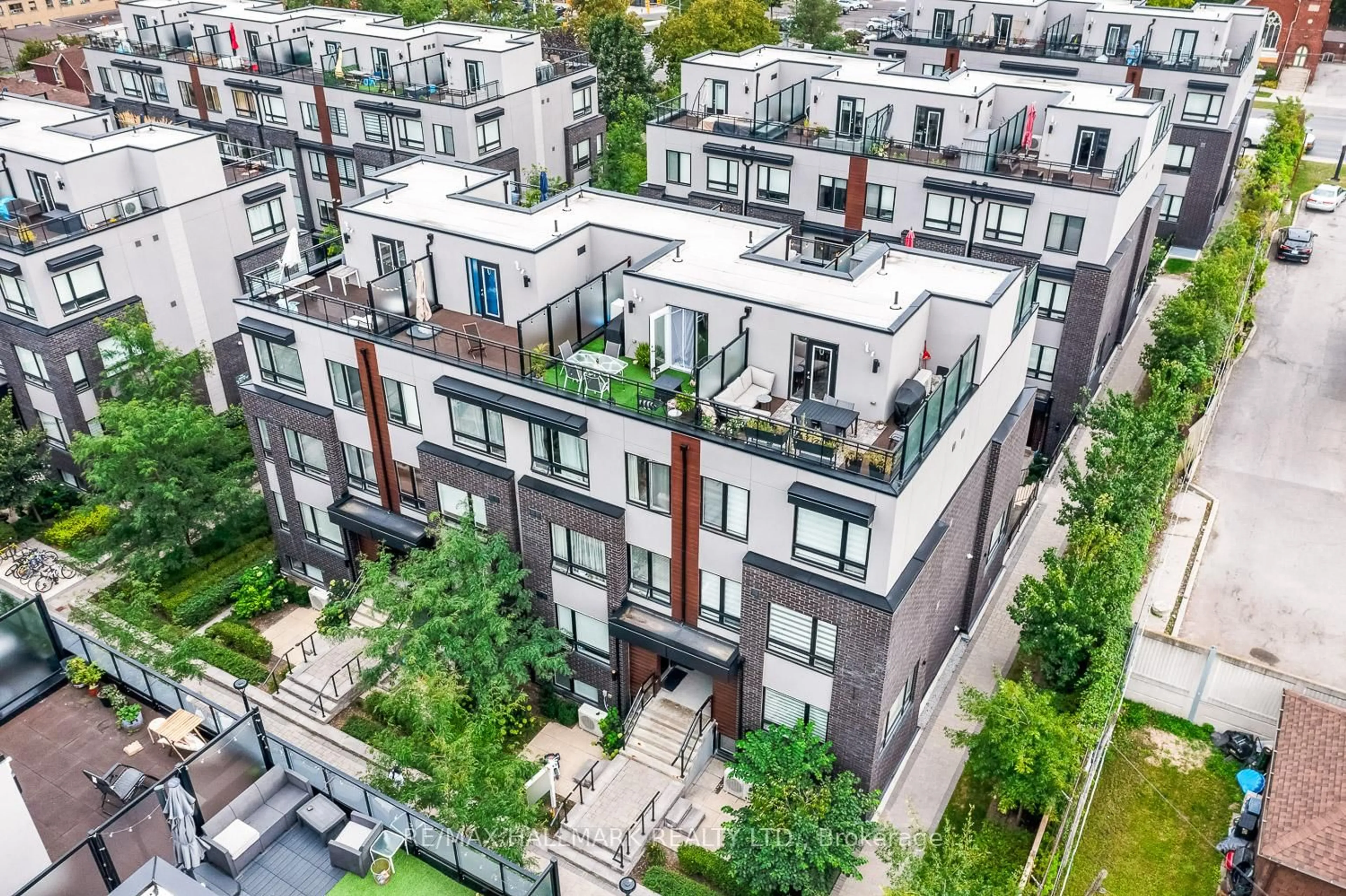 A pic from outside/outdoor area/front of a property/back of a property/a pic from drone, city buildings view from balcony for 1120 Briar Hill Ave #306, Toronto Ontario M6B 0A9